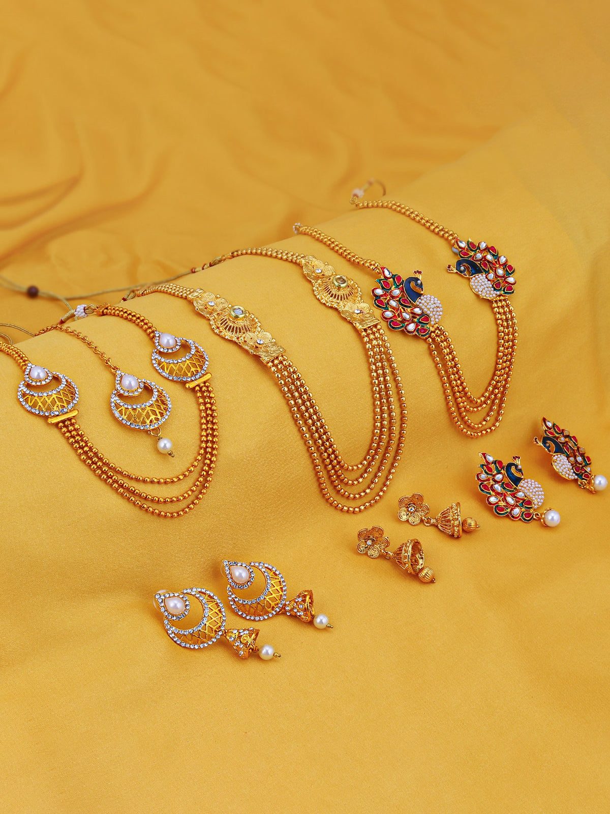 Sukkhi Gorgeous Pearl Gold Plated Kundan Peacock Meenakari Multi-String Necklace Set Combo For Women 457CB2700