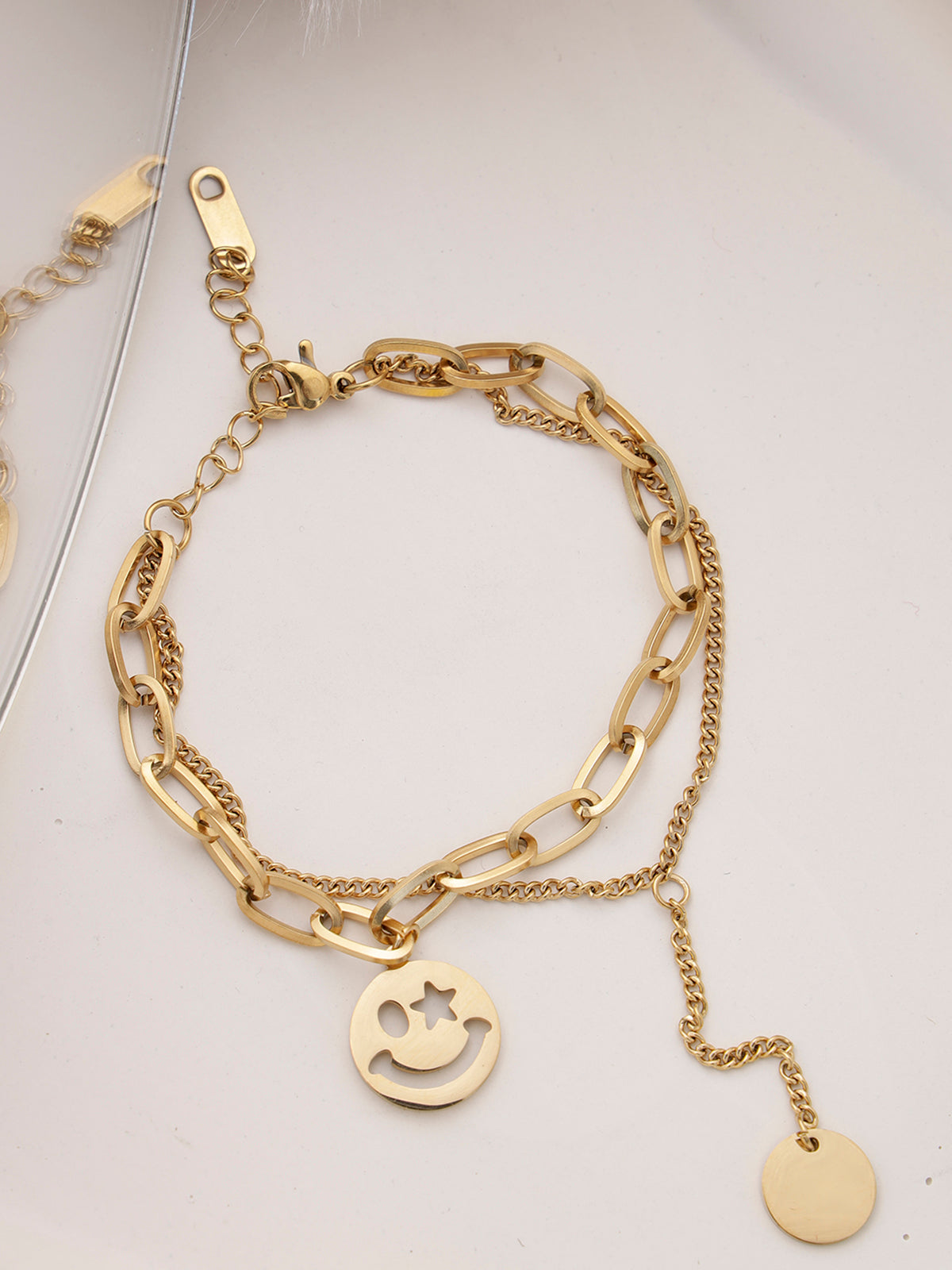 Scintillare By Sukkhi Western 18kGold Plated with Stainless Steel Smiley Charm Adjustable Bracelet Jewellery for Women and Girls|Anti Tarnish Jewellery|Gifts for Wife Girlfriend Mother Sister|BC107011