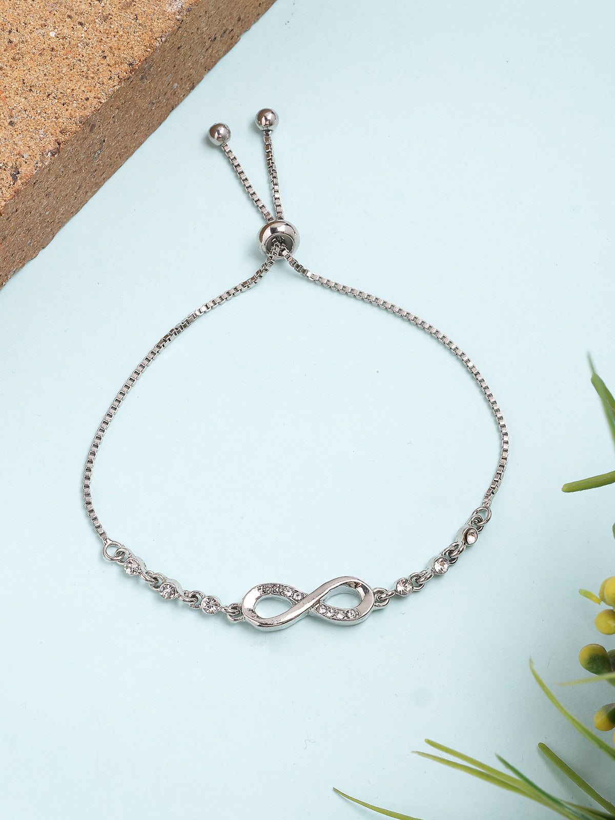 Scintillare By Sukkhi Latest Stylish External Endless Love CZ Diamonds Studded Rhodium Plated Infinity Shaped Slide Closure Silver Bracelet for Women & Girls|BC107136