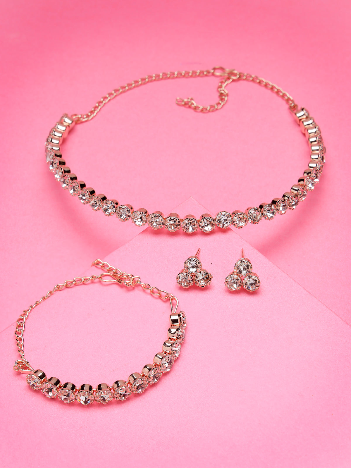 Sukkhi Decorative Crystals Stones Studded Rose Gold Plated Choker Necklace Set with Studs Earrings & Adjustable Bracelet Combo Jewellery Set For Women & Girls|Set of 1|CBMIX106868
