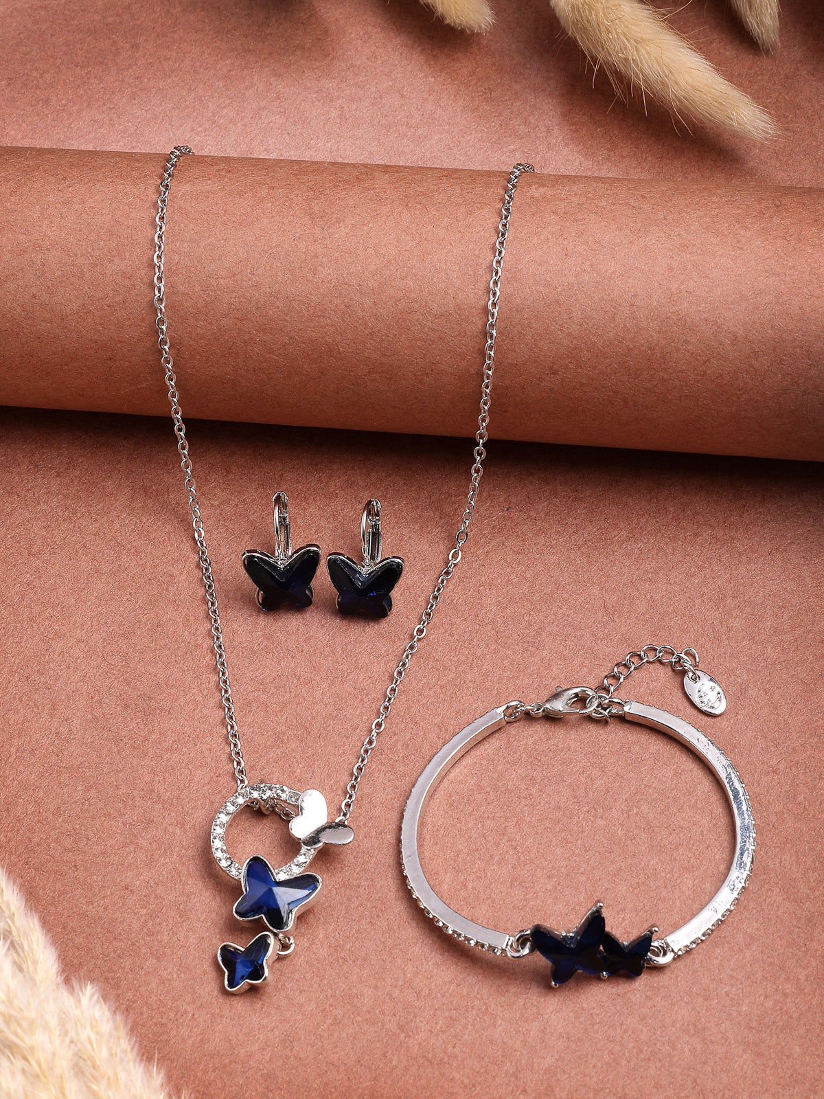 Scintillare By Sukkhi Butterfly Shaped Platinum Plated with Crystal Diamond Studded Pendant Chain Drop Earring Bracelet Blue Combo Jewellery for Women & Girls|CBMIX107210