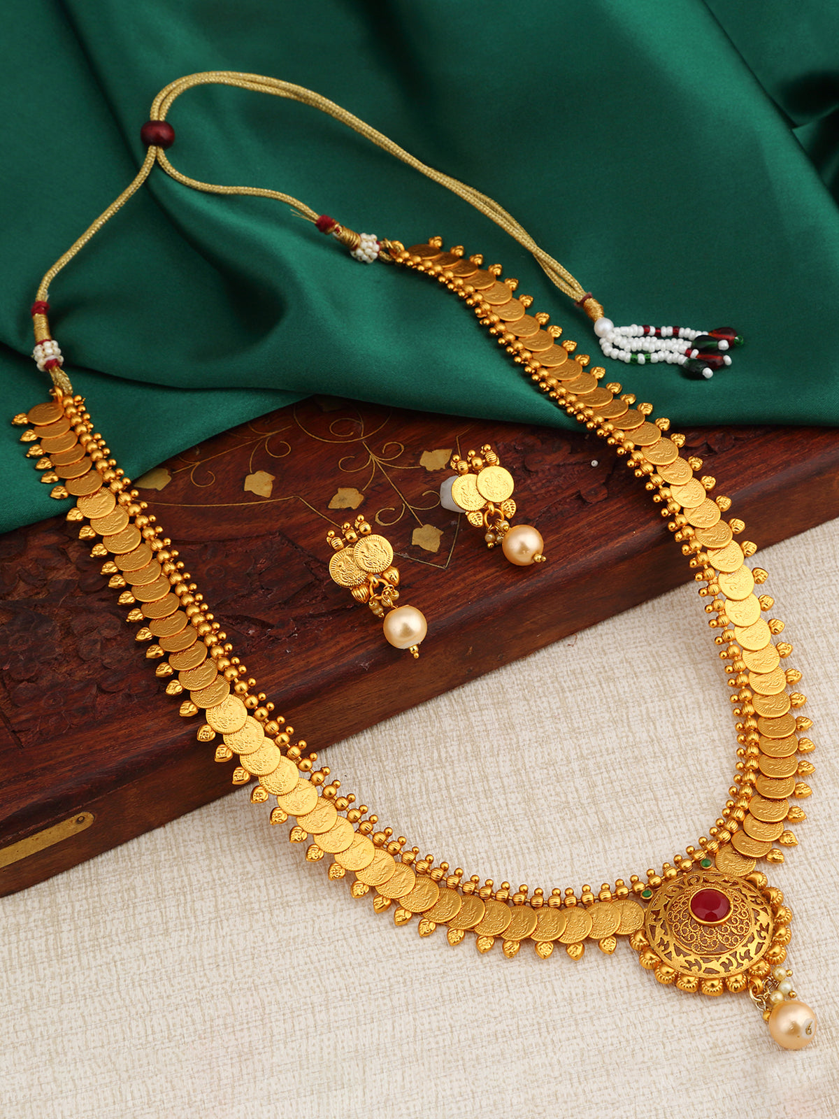 Sukkhi Dazzling Gold Plated Temple Coin Necklace Set For Women N72469GLDPAP022018