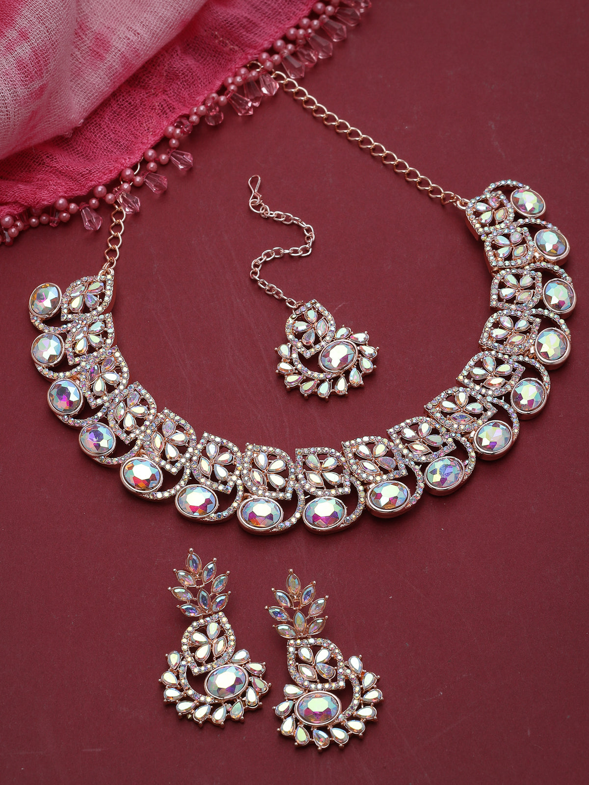 Sukkhi Flashy Rose Gold Plated Rainbow Stones Collar Bone Necklace Set With Earring And Maangtika | Jewellery Set For Women (NS104988)