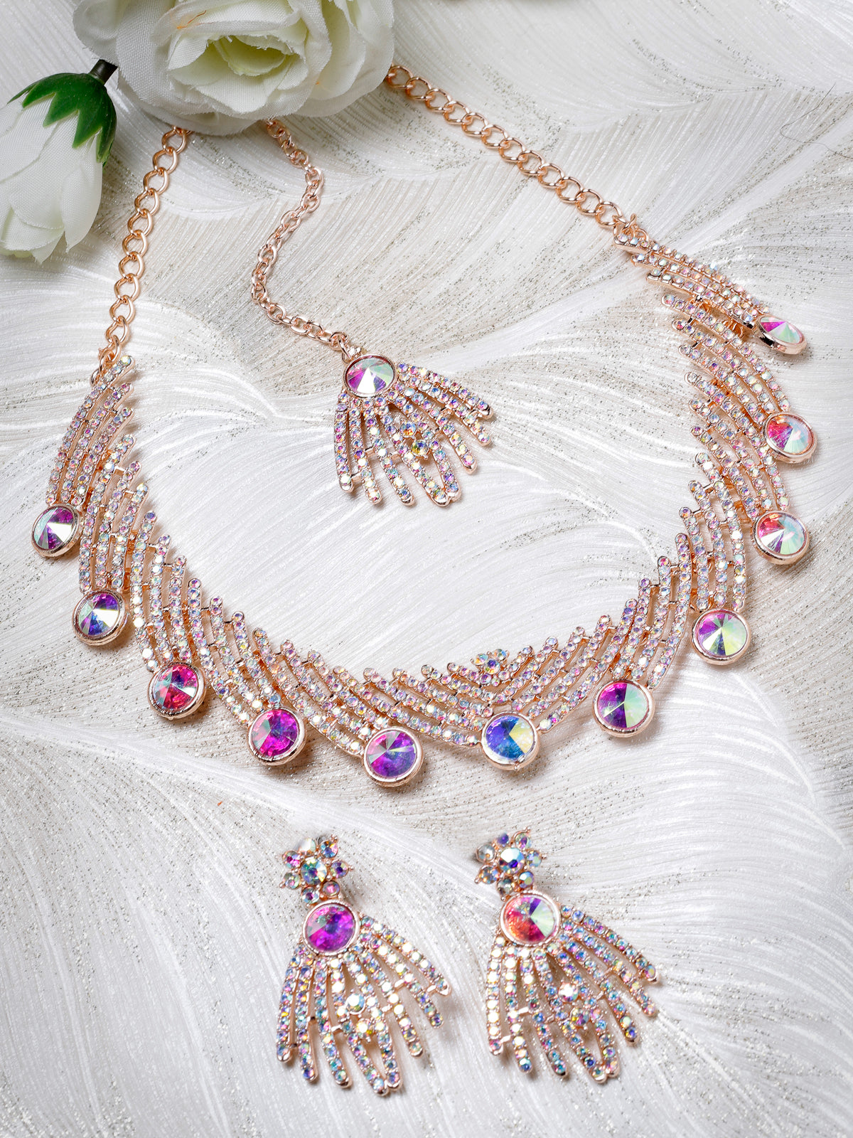 Sukkhi Spunky Rose Gold Plated Rainbow Stones Collar Bone Necklace Set With Earring And Maangtika | Jewellery Set For Women (NS104994)