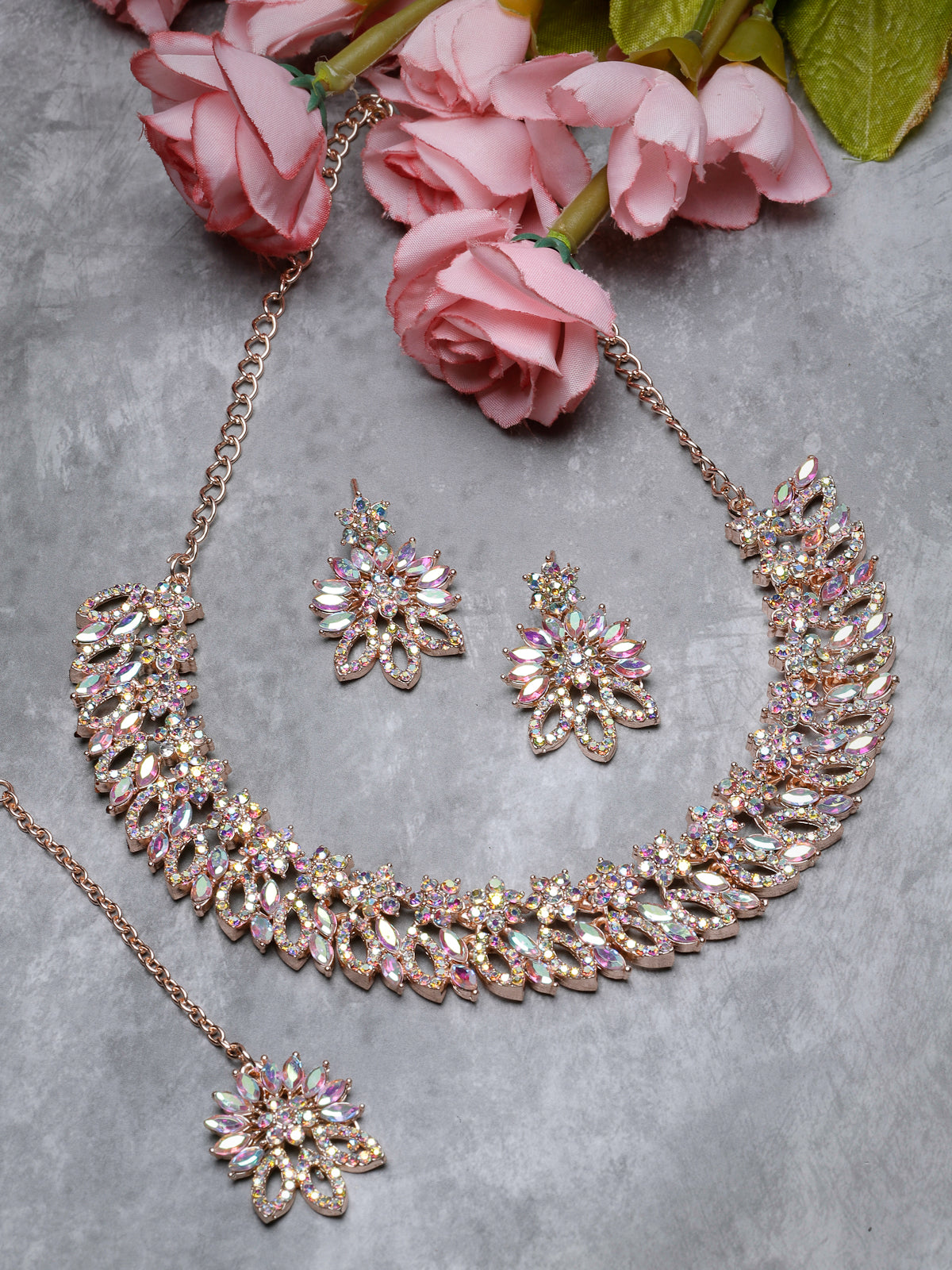 Sukkhi Dangling Rose Gold Plated Stone Floral Collar Bone Necklace Set With Earring And Maangtika | Jewellery Set For Women (NS105489)