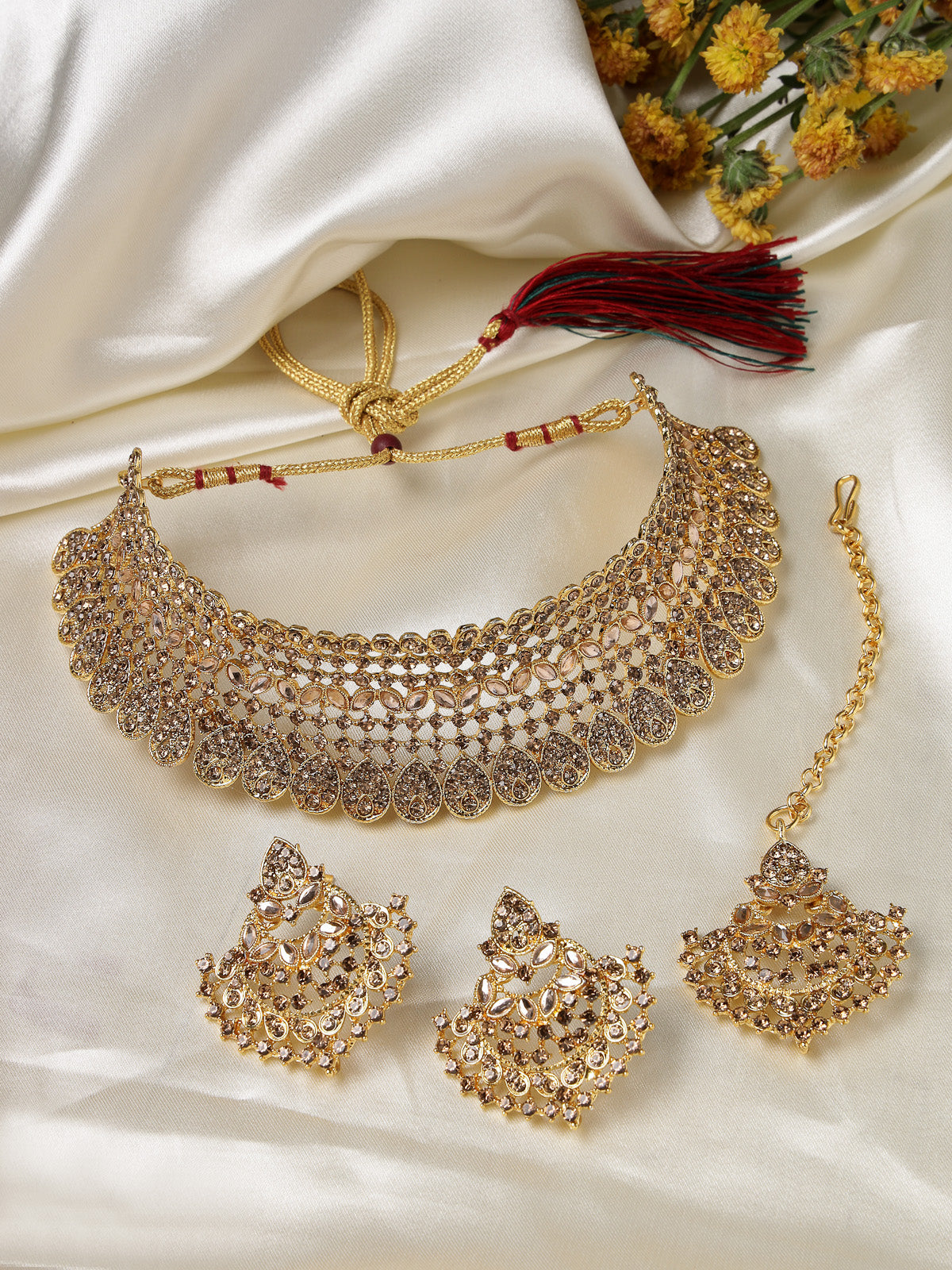 Sukkhi Graceful Curve Shaped Gold Plated LCT AD Stone Choker Necklace Set With Earring And Maangtika | Jewellery Set For Women (NS105578)