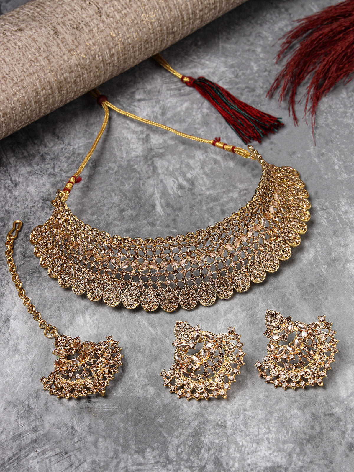 Sukkhi Graceful Curve Shaped Gold Plated LCT AD Stone Choker Necklace Set With Earring And Maangtika | Jewellery Set For Women (NS105578)