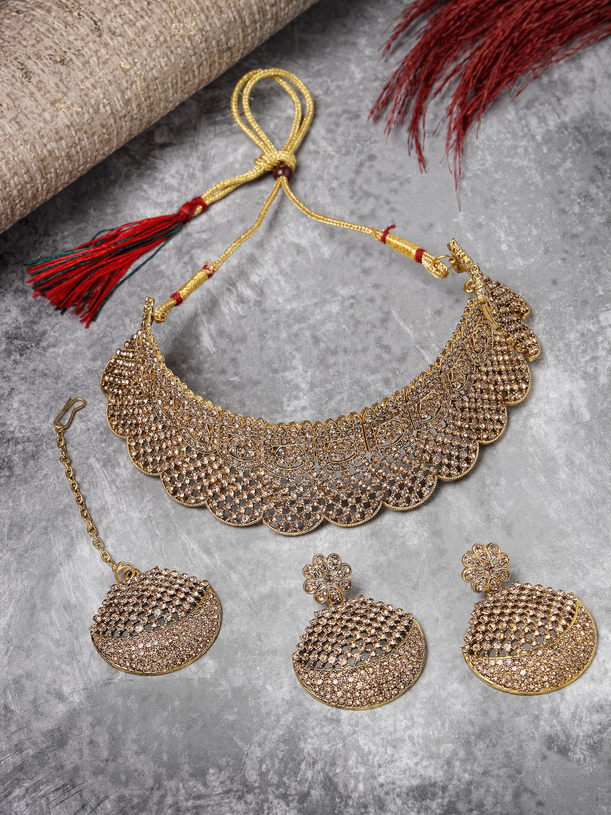 Sukkhi Graceful Curve Shaped Gold Plate White AD Stone Choker Necklace Set With Earring And Maangtika | Jewellery Set For Women (NS105608)