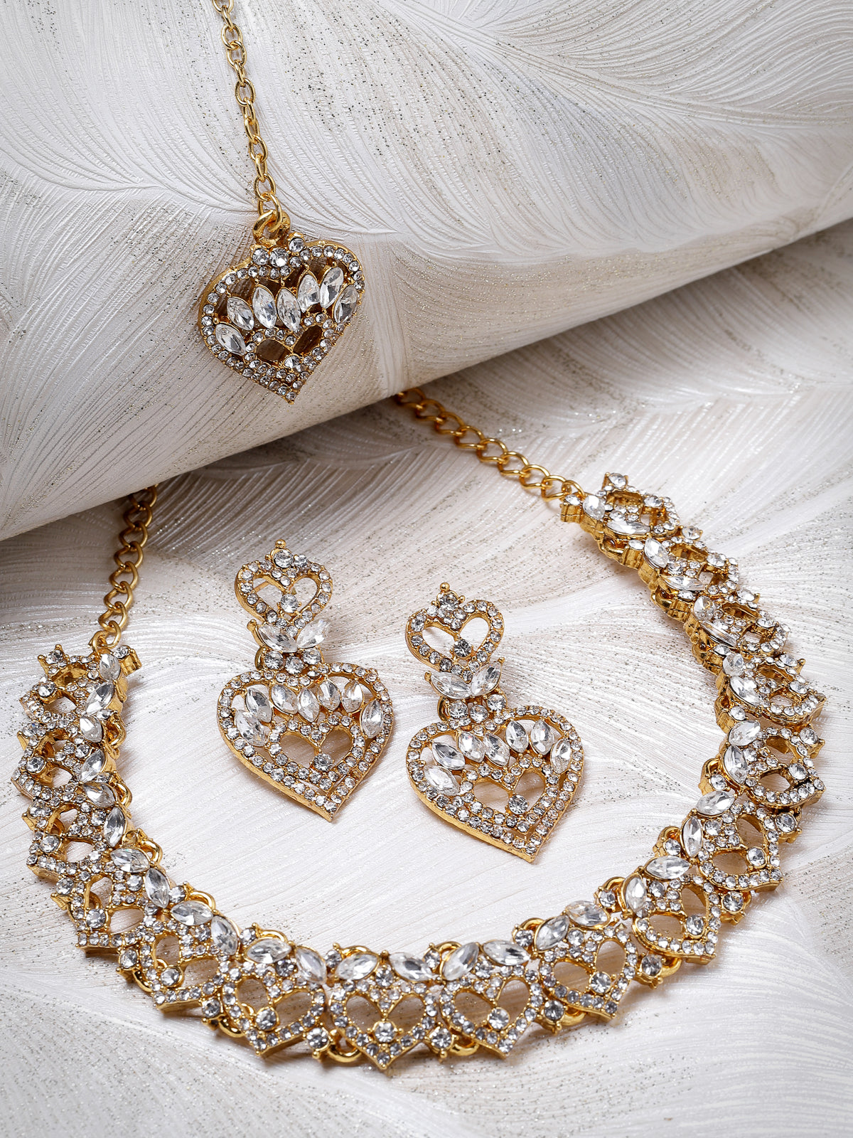 Sukkhi Wonderful Gold Plated AD White Stone Collar Bone Necklace Set With Earring And Maangtika | Jewellery Set For Women (NS105620)