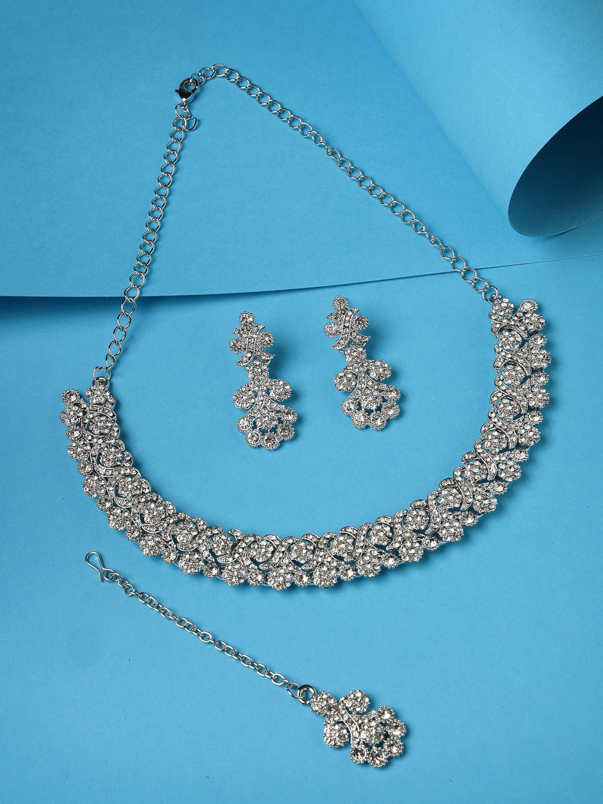 Sukkhi Excellent Rhodium Plated Silver AD White Stone Collar Bone Necklace Set With Earring And Maangtika | Jewellery Set For Women (NS105634)