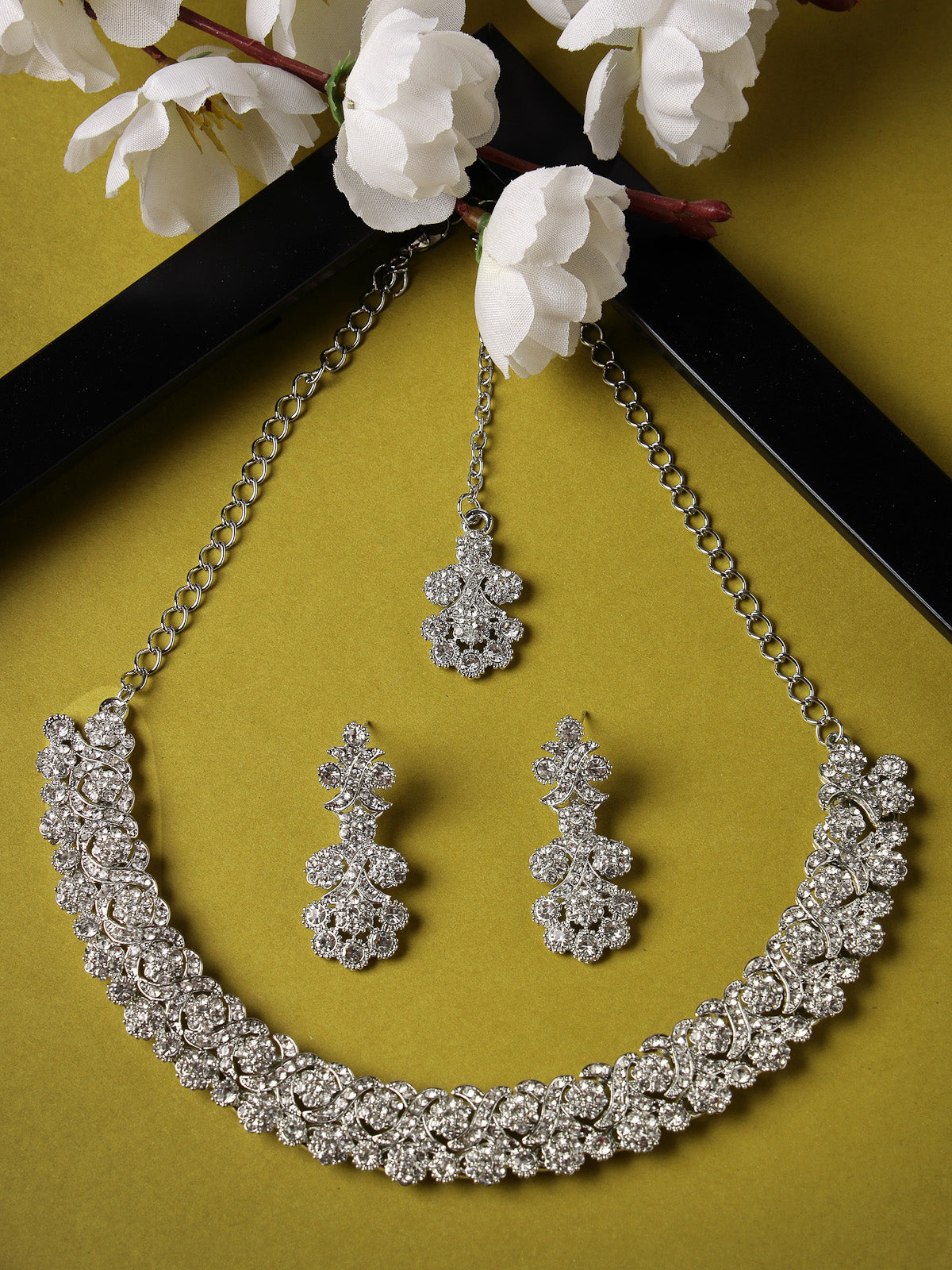 Sukkhi Excellent Rhodium Plated Silver AD White Stone Collar Bone Necklace Set With Earring And Maangtika | Jewellery Set For Women (NS105634)