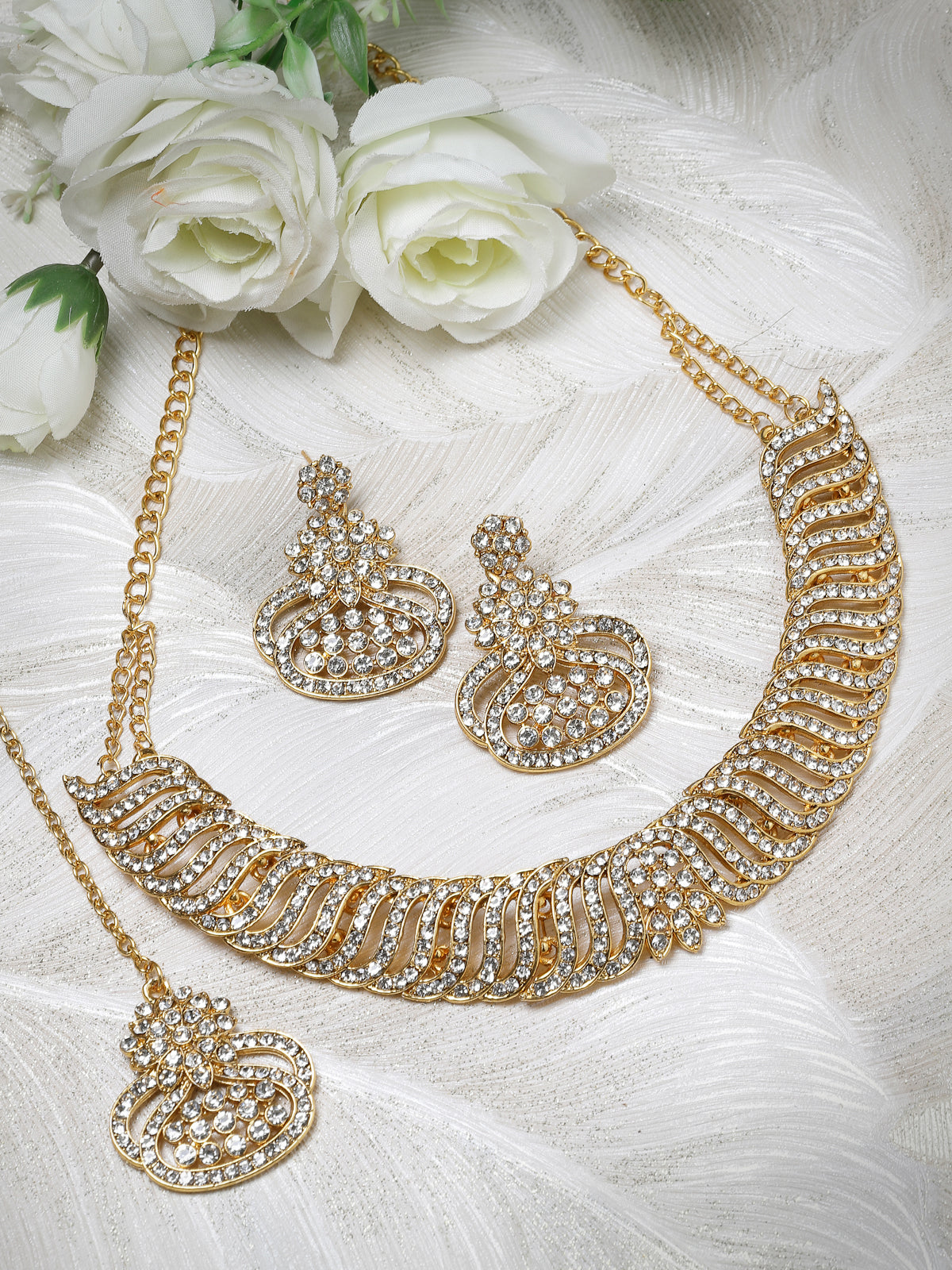 Sukkhi Soothing Gold Plated AD White Stone Collar Bone Necklace Set With Earring And Maangtika | Jewellery Set For Women (NS105636)