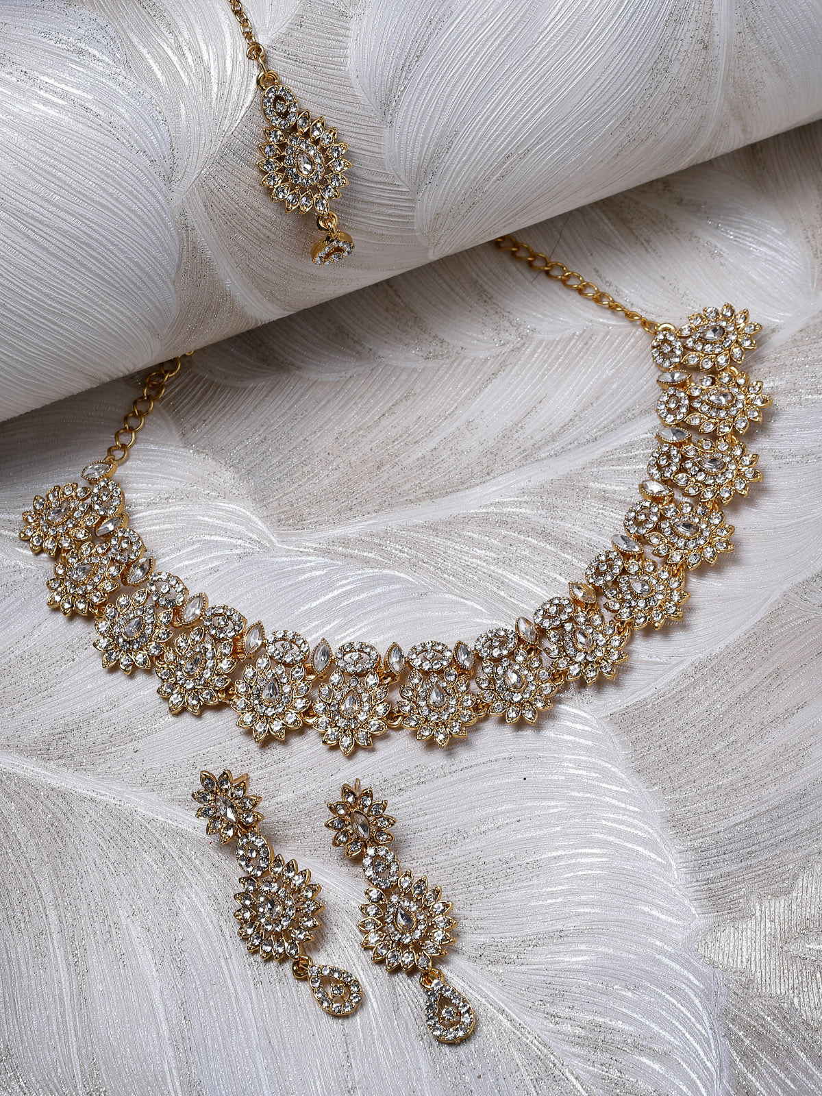 Sukkhi Eye-Catching Gold Plated AD Stone Collar Bone Necklace Set With Earring And Maangtika | Jewellery Set For Women (NS105647)