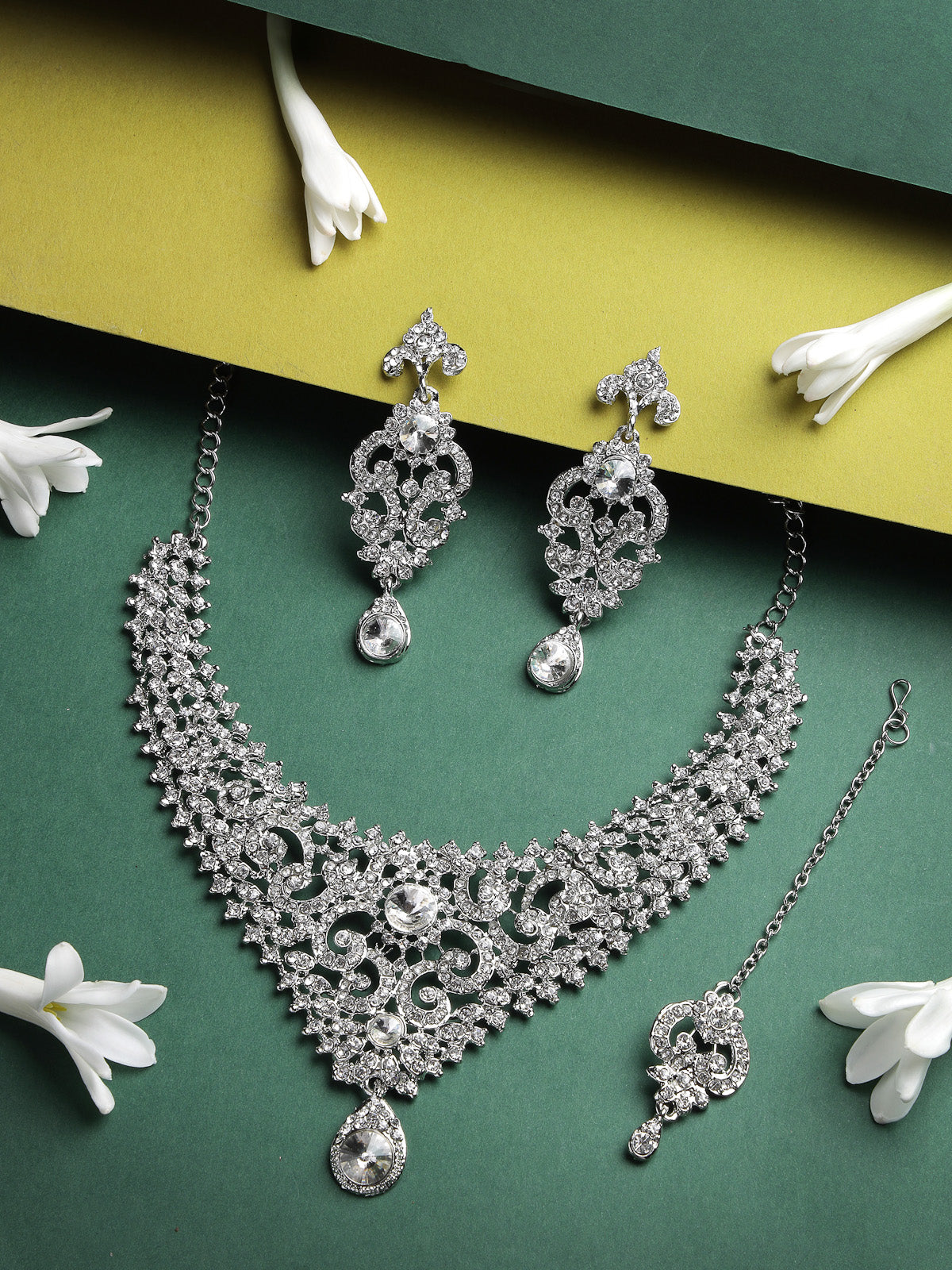 Sukkhi Flawless Rhodium Plated Silver AD White Stone Collar Bone Necklace Set With Earring And Maangtika | Jewellery Set For Women (NS105665)