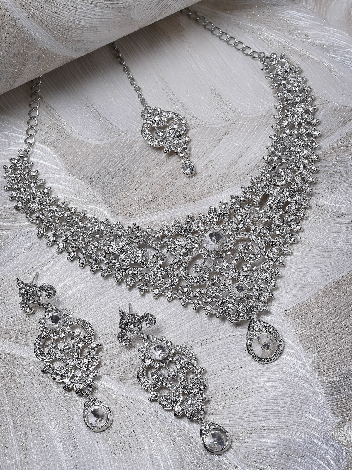 Sukkhi Flawless Rhodium Plated Silver AD White Stone Collar Bone Necklace Set With Earring And Maangtika | Jewellery Set For Women (NS105665)