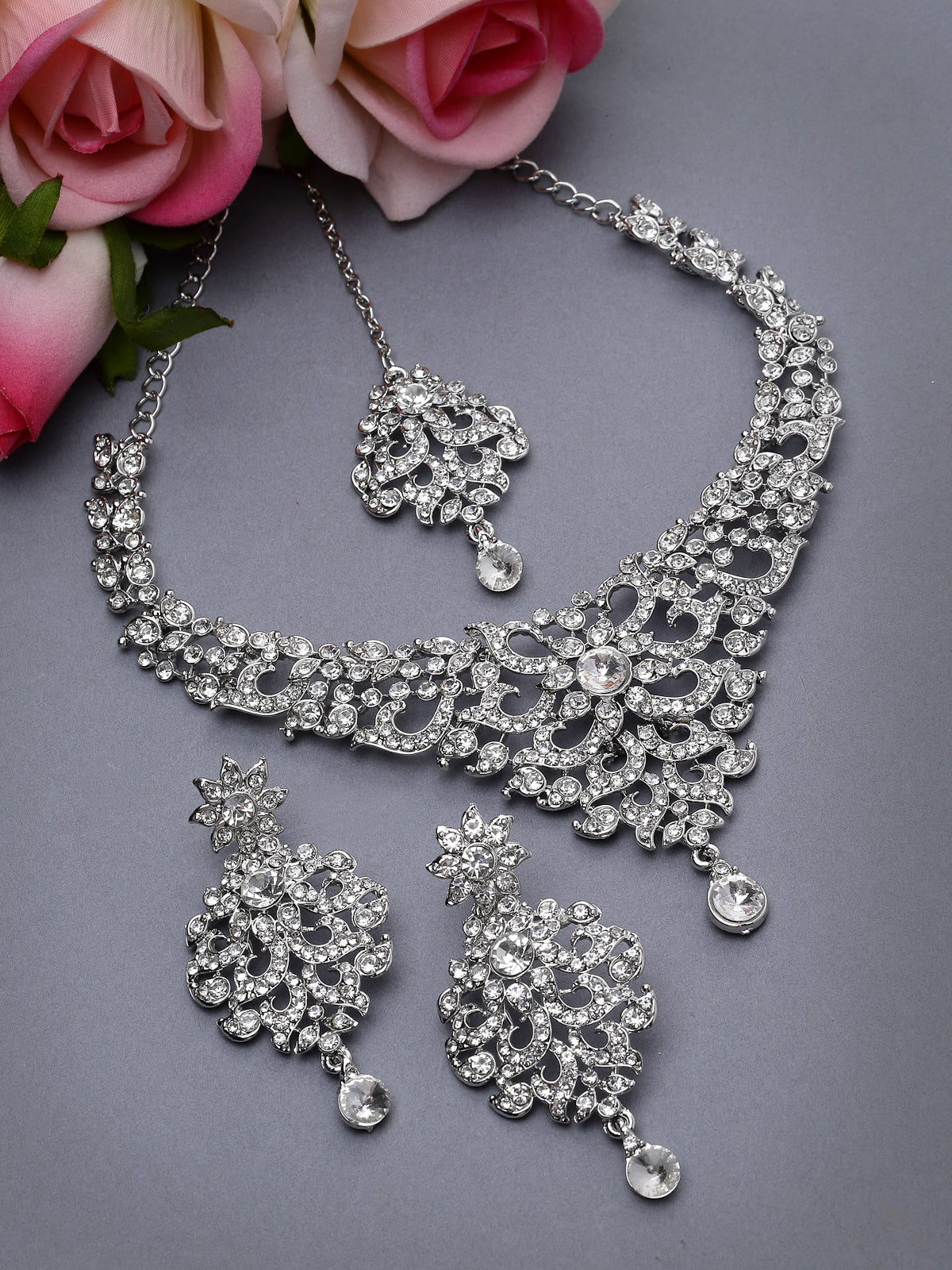 Sukkhi Luminous Rhodium Plated Silver AD White Stone Collar Bone Necklace Set With Earring And Maangtika | Jewellery Set For Women (NS105667)