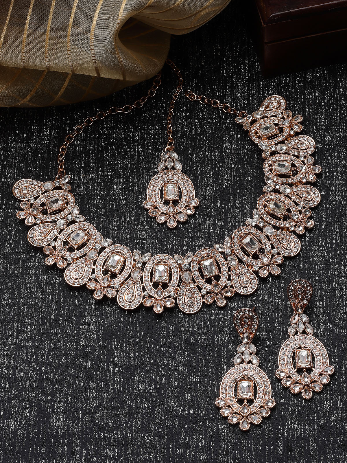Sukkhi Creative Gold Plated AD Stone Collar Bone Necklace Set With Earring And Maangtika | Jewellery Set For Women (NS105699)