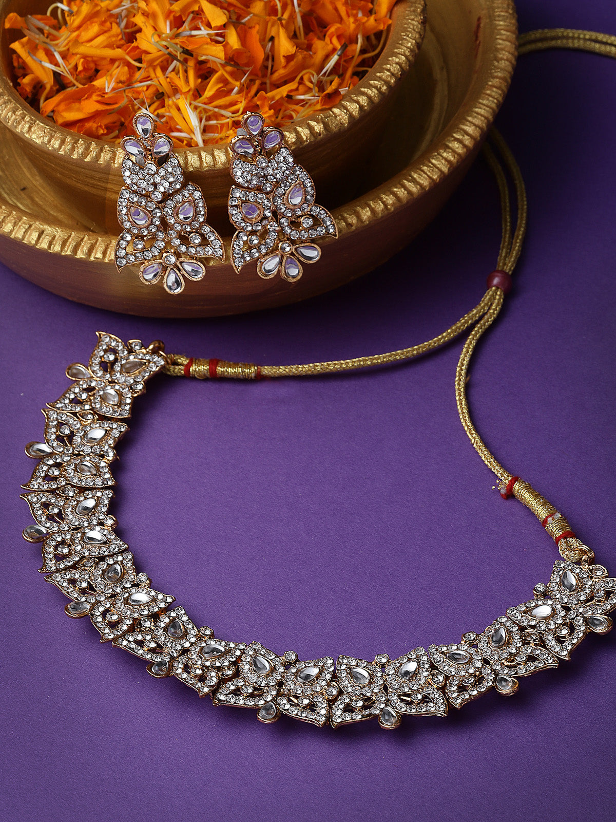 Sukkhi Fierce Gold Plated AD White Stone Collar Bone Necklace Set And Earring | Jewellery Set For Women (NS105708)