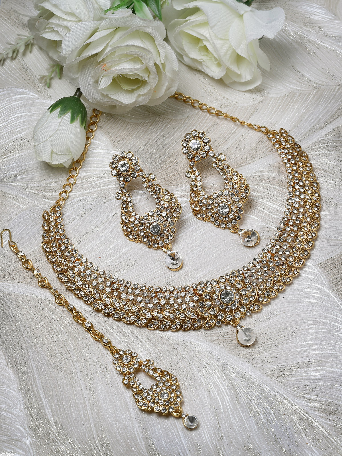 Sukkhi Exhilarating Gold Plated AD White Stone Collar Bone Necklace Set With Earring And Maangtika | Jewellery Set For Women (NS105714)
