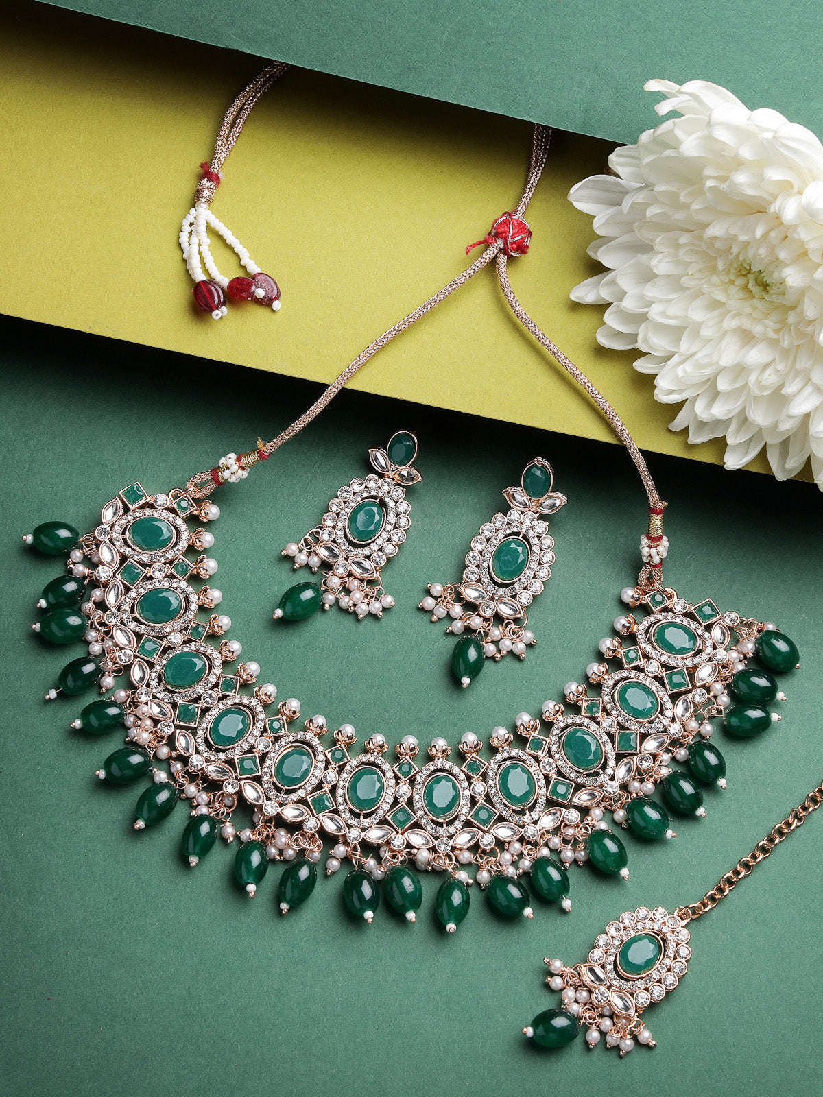Sukkhi Bright Gold Plated AD Green Stones With Drop Beads Collar Bone Necklace Set With Earring And Maangtika | Jewellery Set For Women (NS105717)