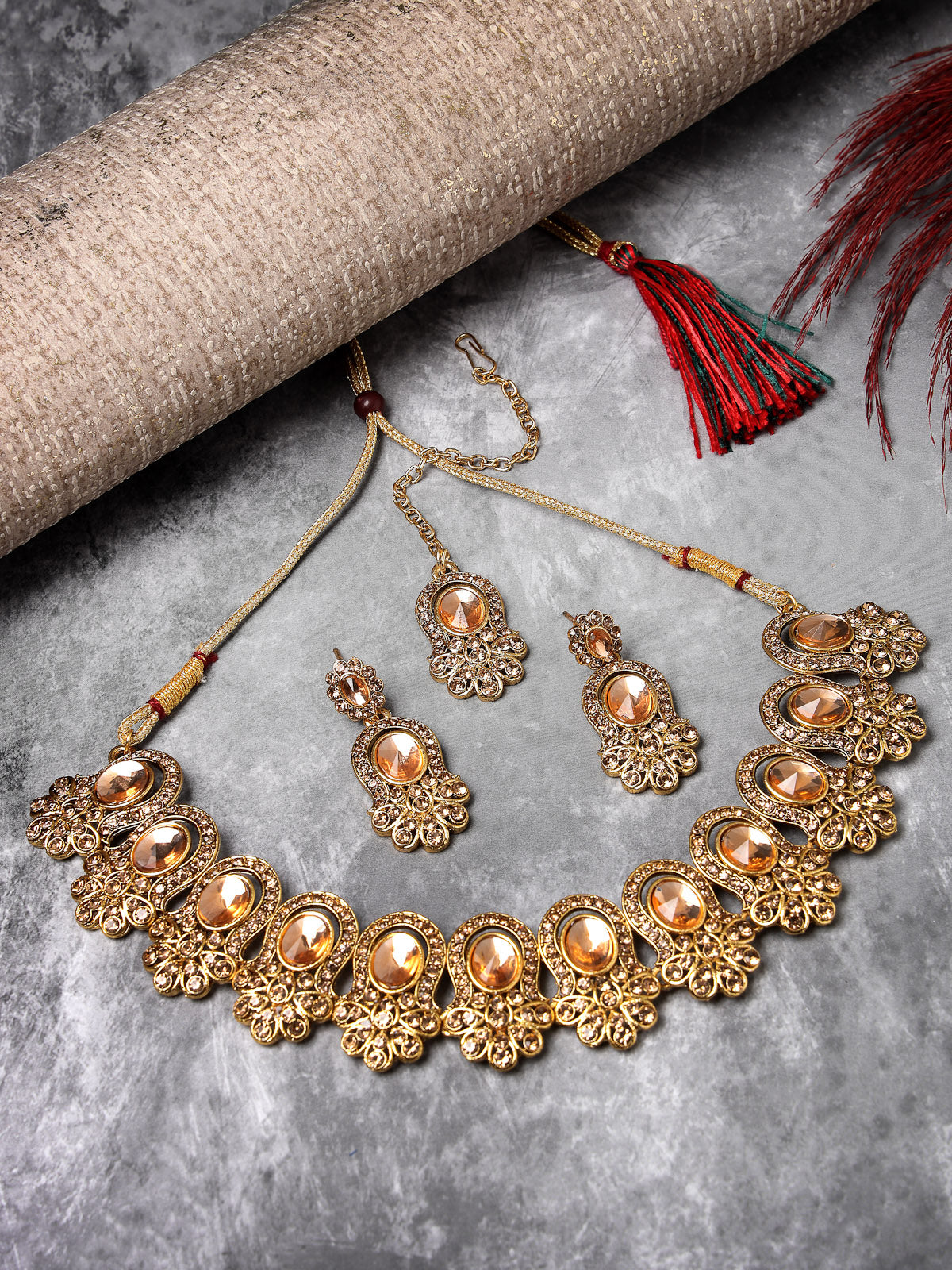 Sukkhi External Gold Plated AD Stone Collar Bone Necklace Set With Earring And Maangtika | Jewellery Set For Women (NS105722)