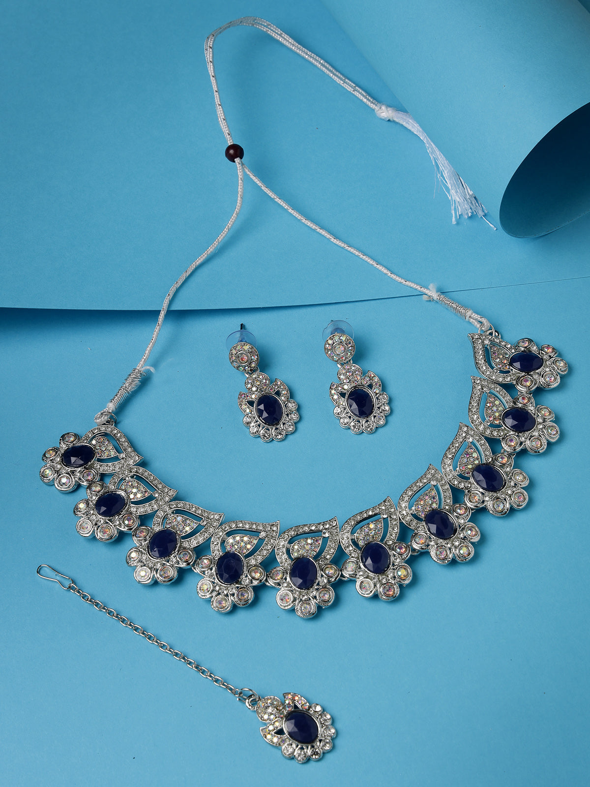 Sukkhi Fancy Rhodium Plated Blue AD Stone Collar Bone Necklace Set With Earring And Maangtika | Jewellery Set For Women (NS105723)