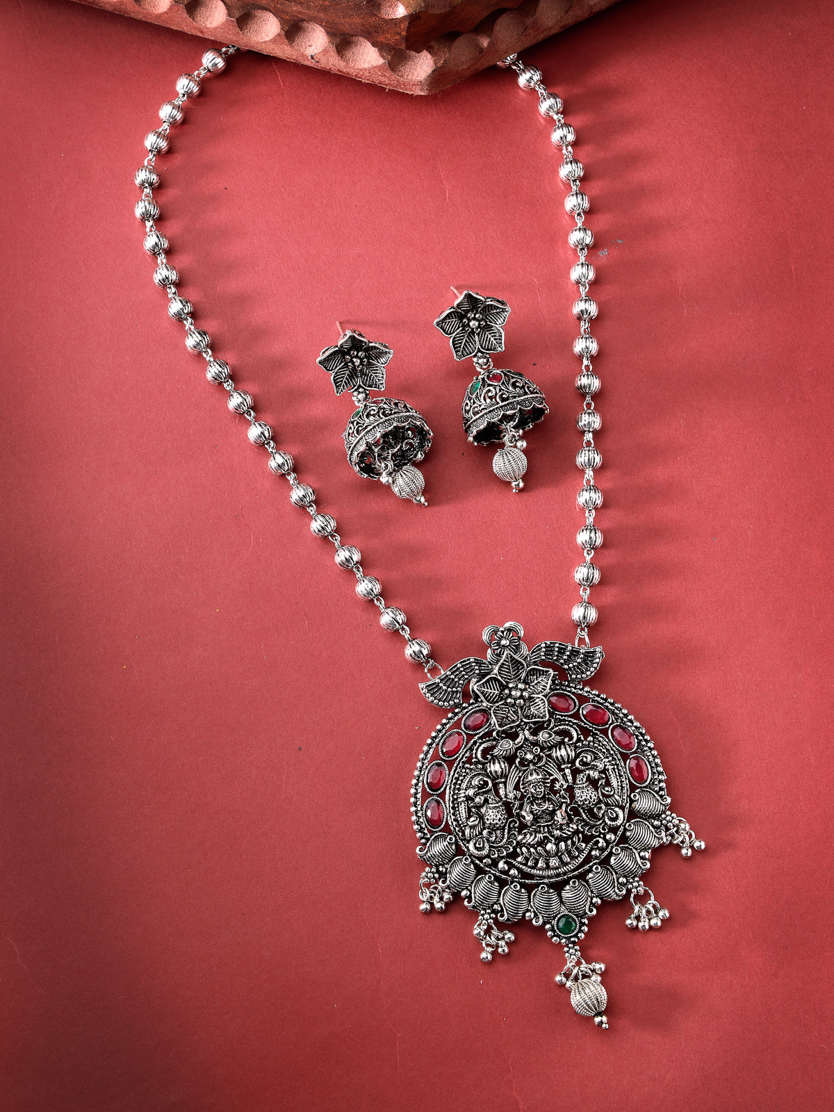 Sukkhi Vintage Ethnic Oxidesed Rhodium Silver Plated Red AD Stones Studded Long Ball Chain with Temple Pendant Necklace Set & Jhumki/Jhumka Earring Jewellery Set For Women & Girls|Set of 1|NS106048