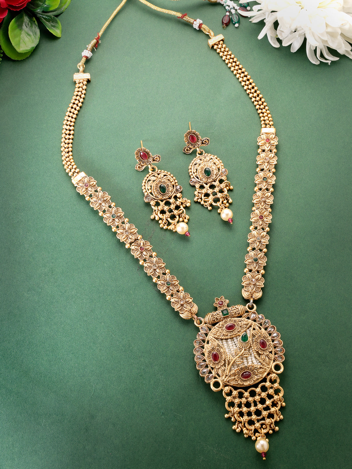 Sukkhi Heavy Look Gold Plated Red Green AD Stones Studded Floral Gold Haram Designs Long Necklace Set with Dangler Earrings Jewellery Set For Women & Girls|Set of 1|NS106087