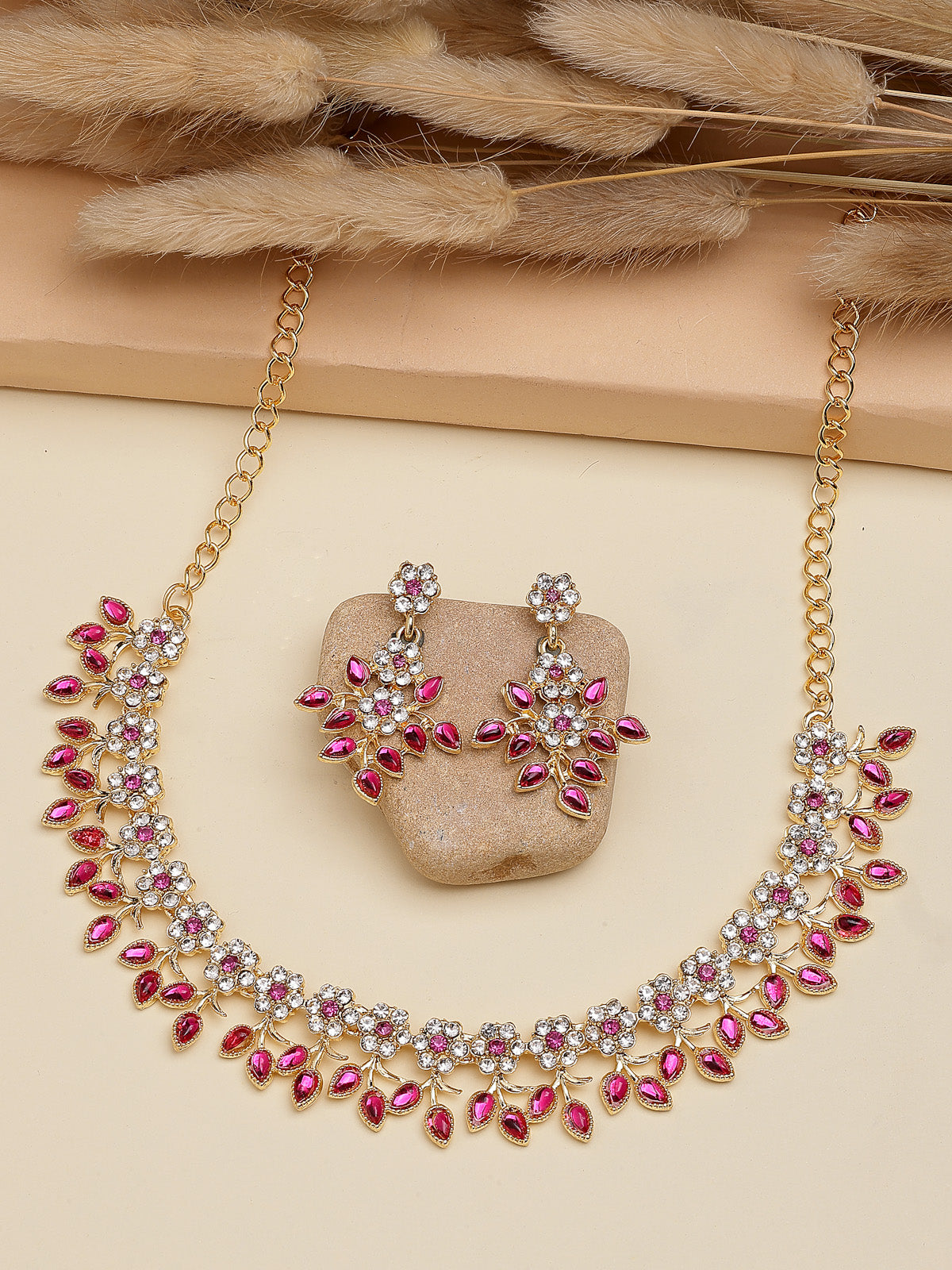 Sukkhi Charming Design Gold Plated AD Stone with Floral & Leaf Shaped Rani Pink Choker Necklace with Dangle Earring Jewellery Set For Women & Girls|NS107401