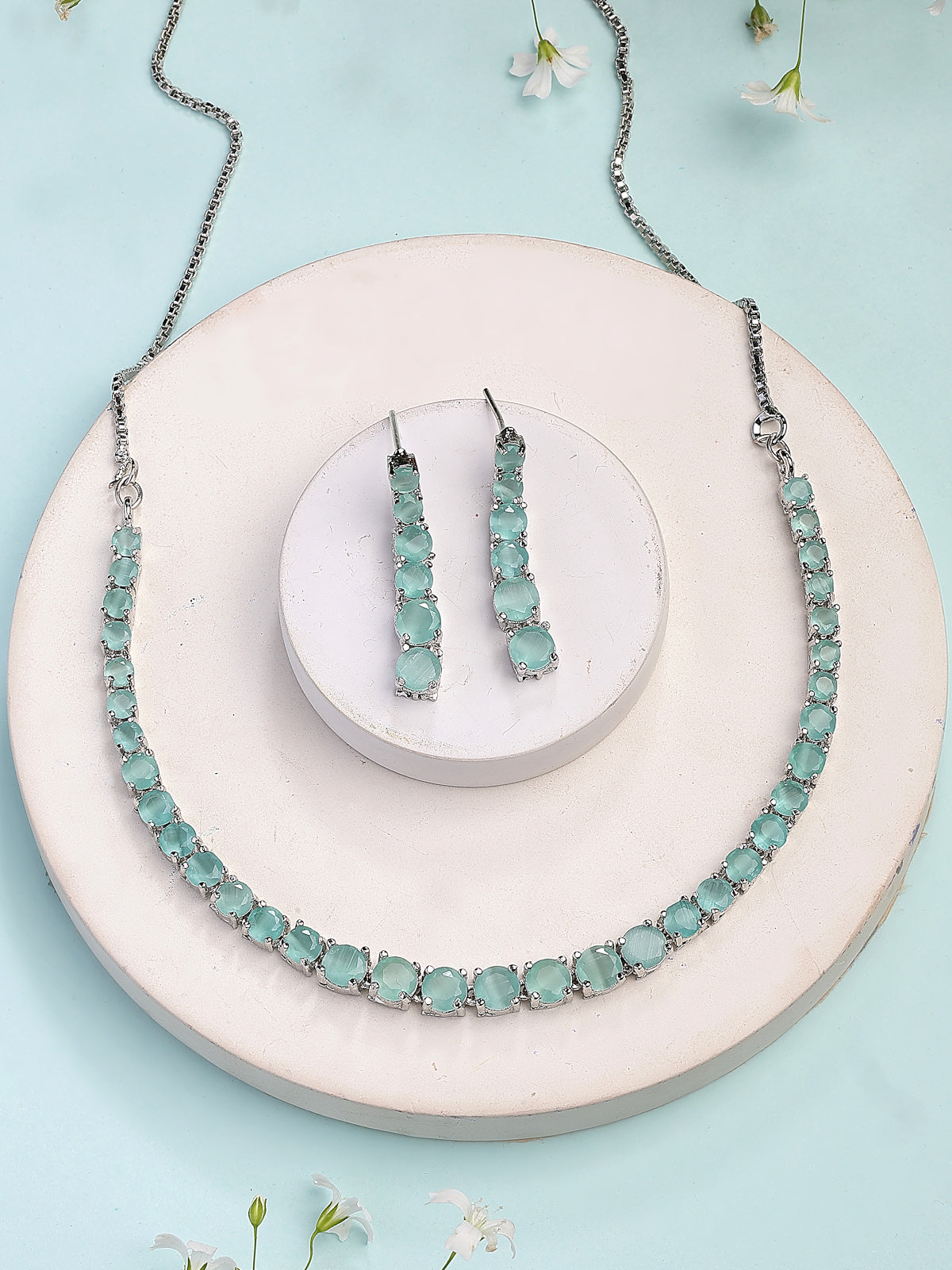 Sukkhi Classic Style American Diamond Studded Rhodium Silver Plated Handmade Circle Aqua Blue Choker Necklace With Dangle Earrings Jewellery Set for Women & Girs|NS107429