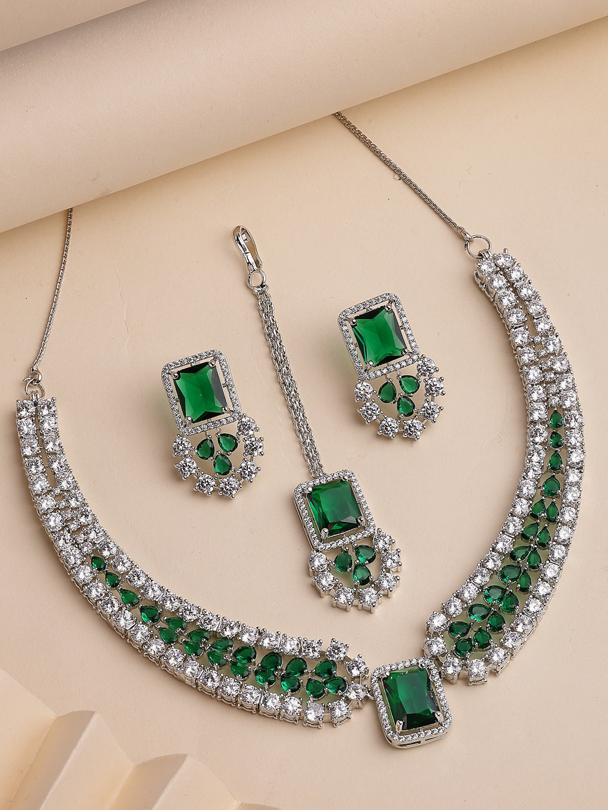Sukkhi Latest Stylish Rhodium Plated Cubic Zirconia Studded Brass Emerald Green Collar Necklace & Studs Earring & Maangtikka Jewellery Set for Women|Latest Stylish Gifts for All Occasions|NS115977