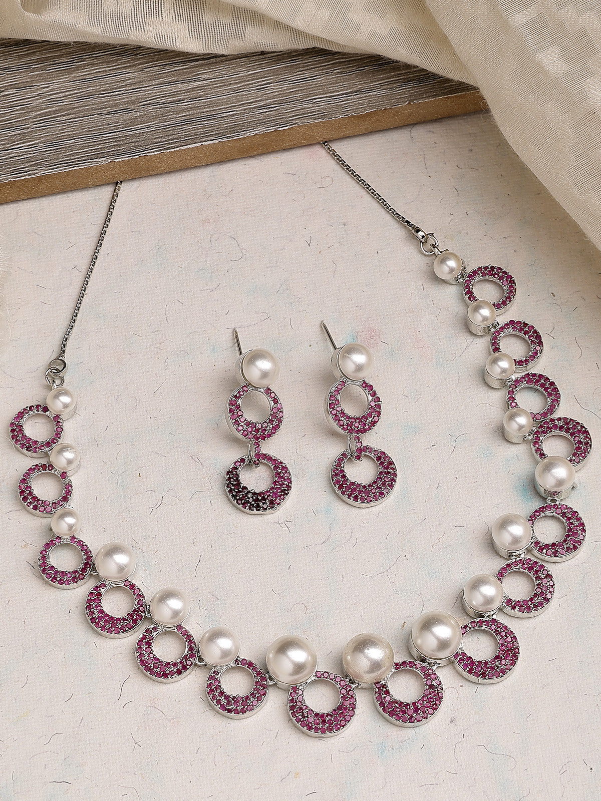 Sukkhi External Stylish Rhodium Plated with Cubic Zirconia & Pearl Studded Red Brass Collar Necklace with Drop Earrings Jewellery Set for Women|Latest Stylish Gifts for All Occasions|NS116021