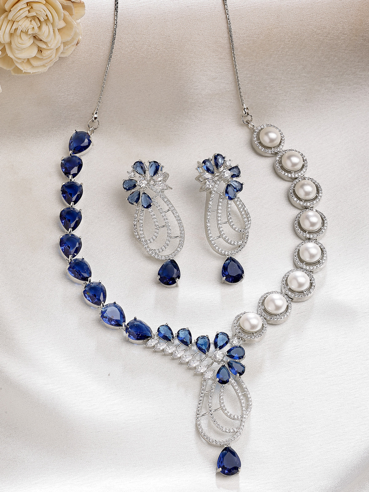 Sukkhi Classic Tear Drop Round Design Rhodium Plated Cubic Zirconia & Pearl Studded Blue Brass Collar Necklace & Drop Earrings Jewellery Set for Women|Latest Stylish Gifts for All Occasions|NS116057