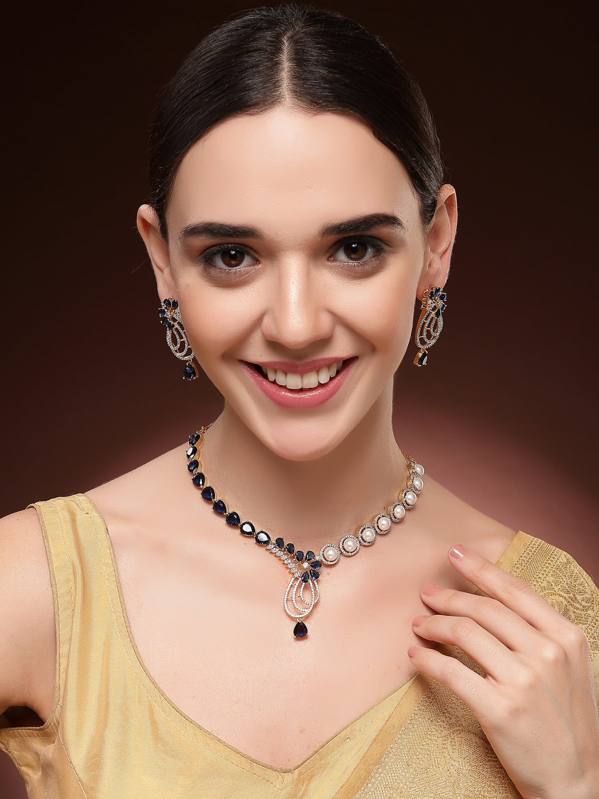Sukkhi Unique Tear Drop Round Design Gold Plated Cubic Zirconia & Pearl Studded Blue Brass Collar Necklace with Drop Earrings Jewellery Set for Women|Latest Stylish Gifts for All Occasions|NS116063
