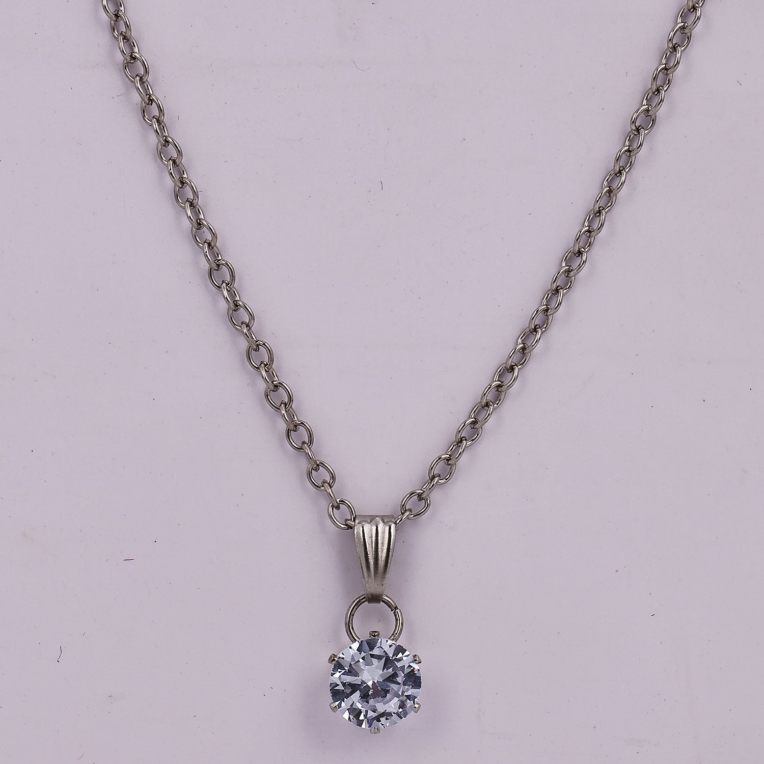 Sukkhi Pretty Round Shaped Silver AD Stone Pendant with Chain Set for Women