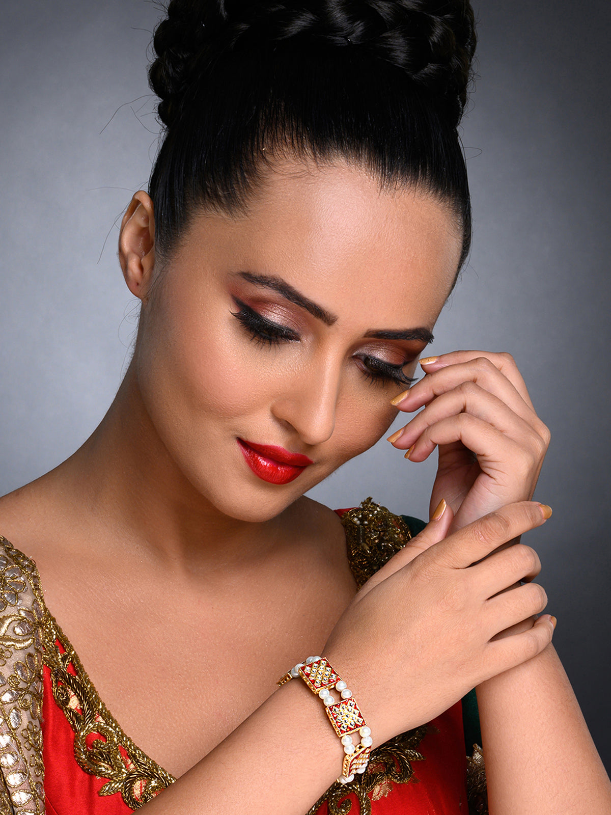 Sukkhi Modish Pearl Gold Plated Meenakari Bracelet for Women SKR85614