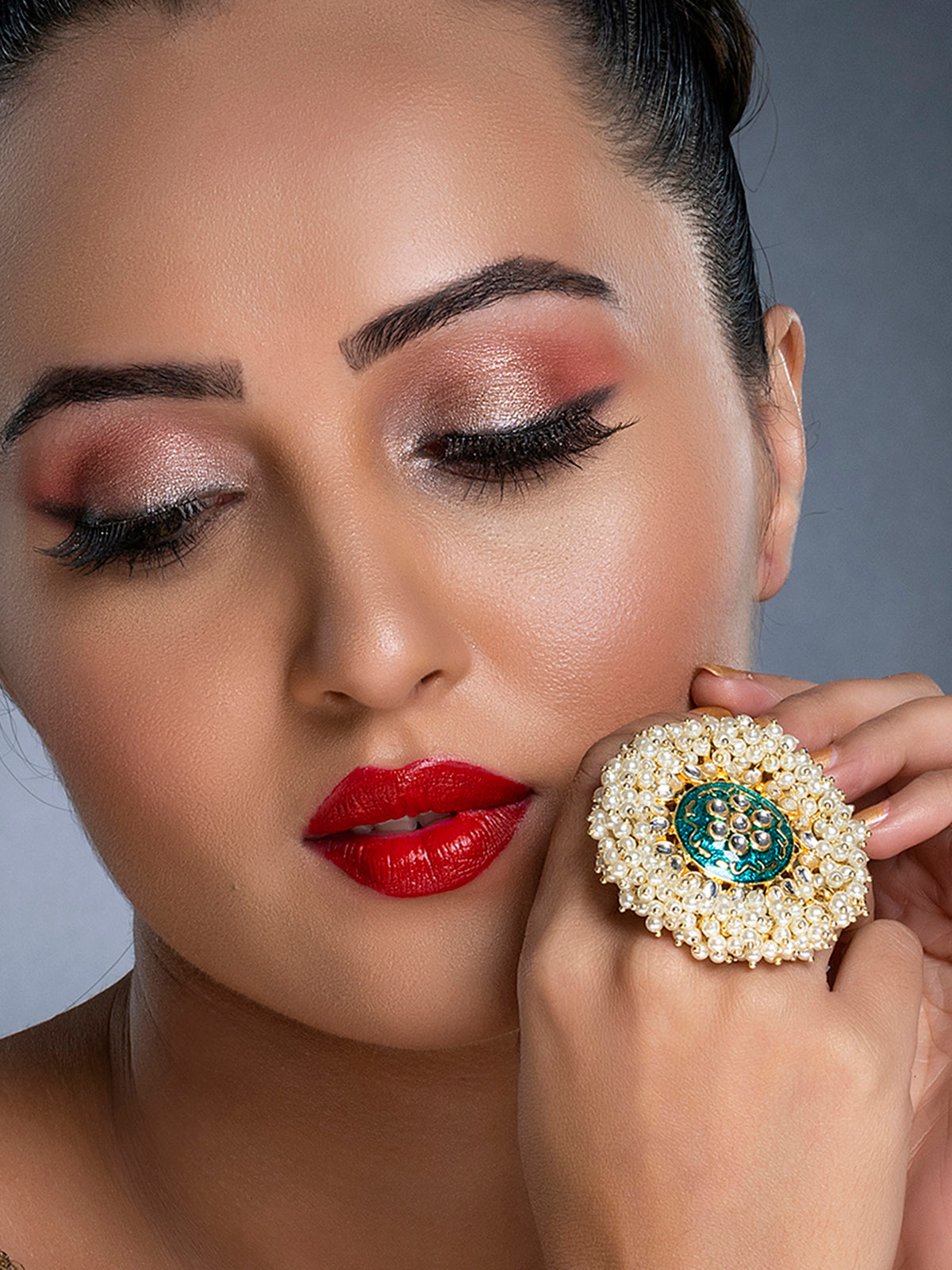 Sukkhi Glitzy Kundan Gold Plated Pearl Ring for Women SKR85679