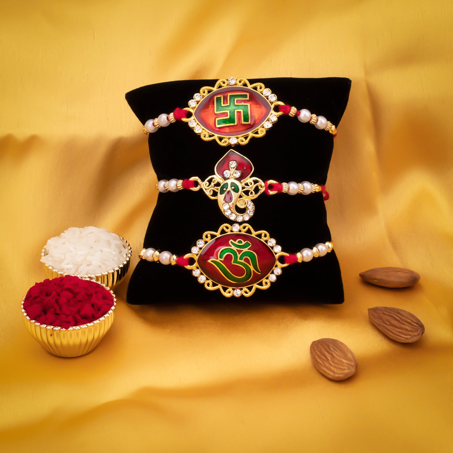 Sukkhi Fabulous Gold Plated Meenakari Ganesha Rakhi Combo (Set of 3) with Roli Chawal and Raksha Bandhan Greeting Card For Men