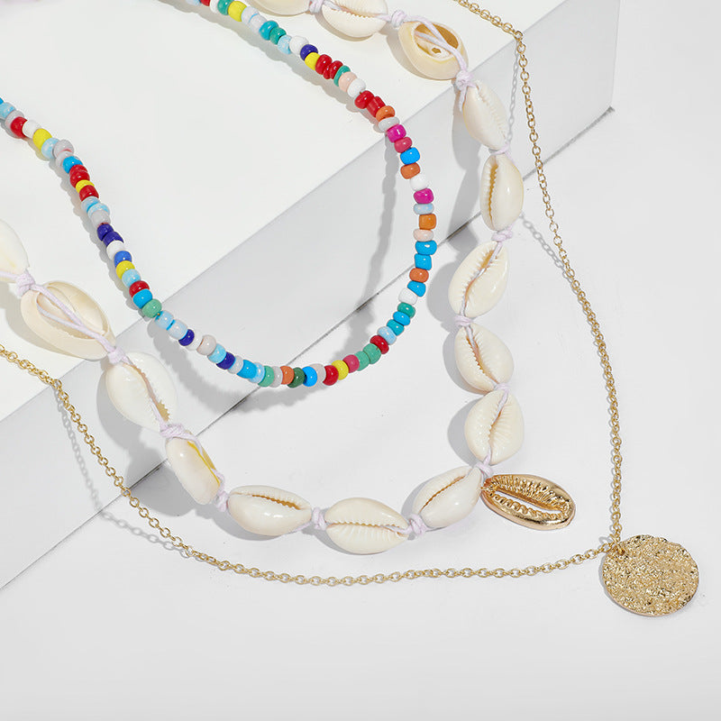 Scintillare by Sukkhi Exclusive Gold Plated Sea Shell Multi Layered Necklace for Women