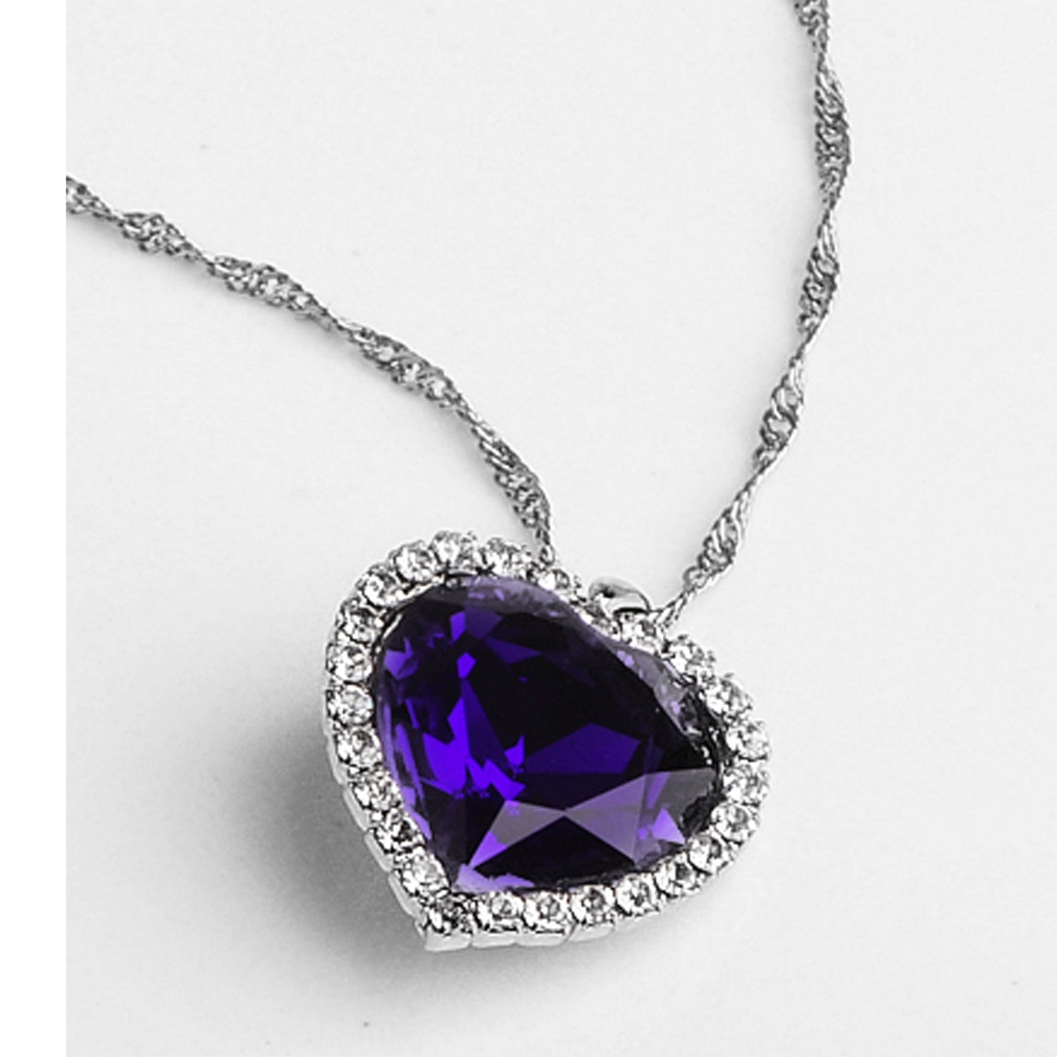 Sukkhi Modern Blue Titanic Valentine Heart Crystal Rhodium Plated Pendant for Women
