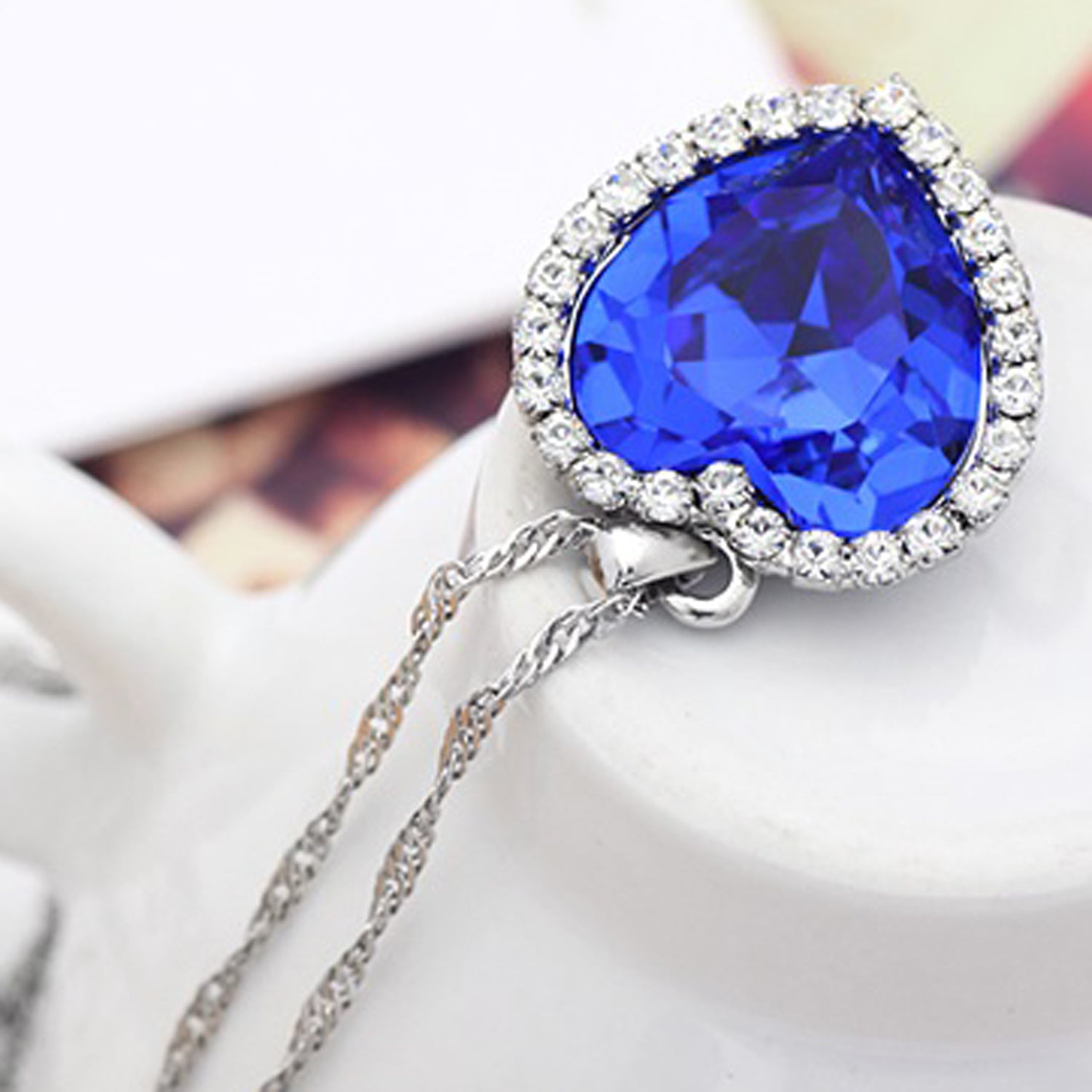 Scintillare by Sukkhi Modern Blue Titanic Valentine Heart Crystals from Swarovski Rhodium Plated Pendant for Women