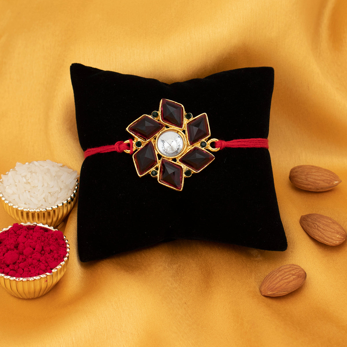 Sukkhi Cluster Gold Plated Red Floral Rakhi with Roli Chawal and Raksha Bandhan Greeting Card For Men