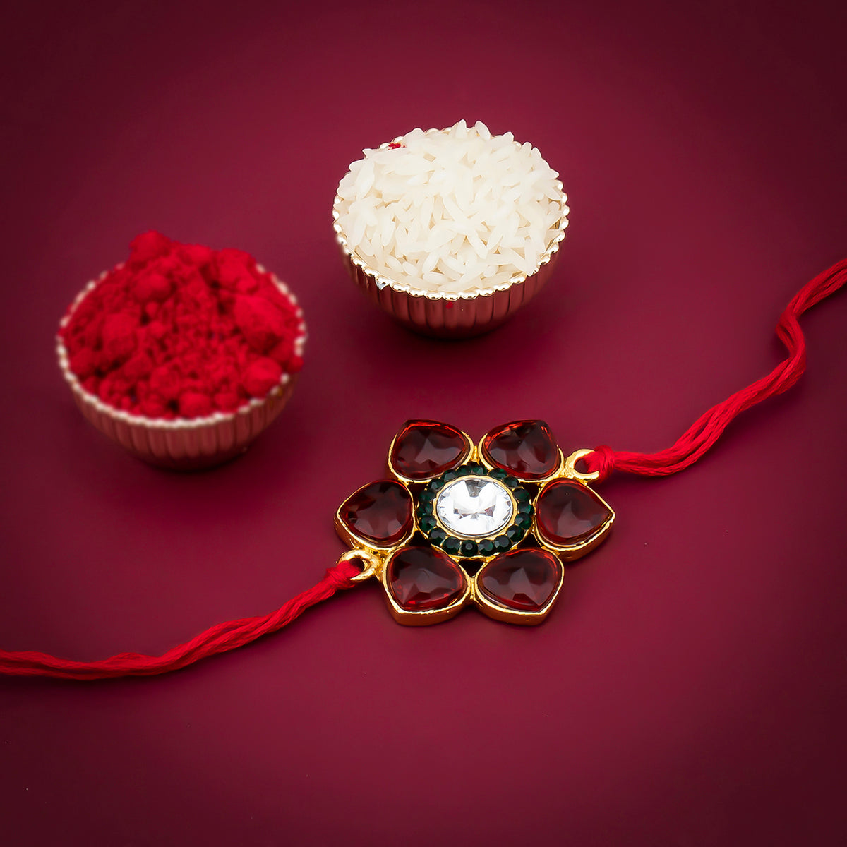 Sukkhi Alluring Gold Plated Floral Rakhi with Roli Chawal and Raksha Bandhan Greeting Card For Men