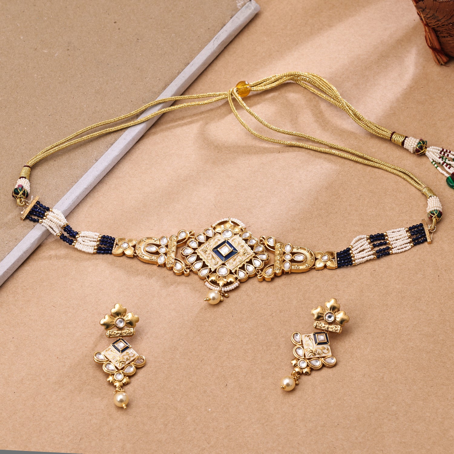 Sukkhi Hypnotizing Gold Plated Kundan & Pearl Golden Necklace Set for Women