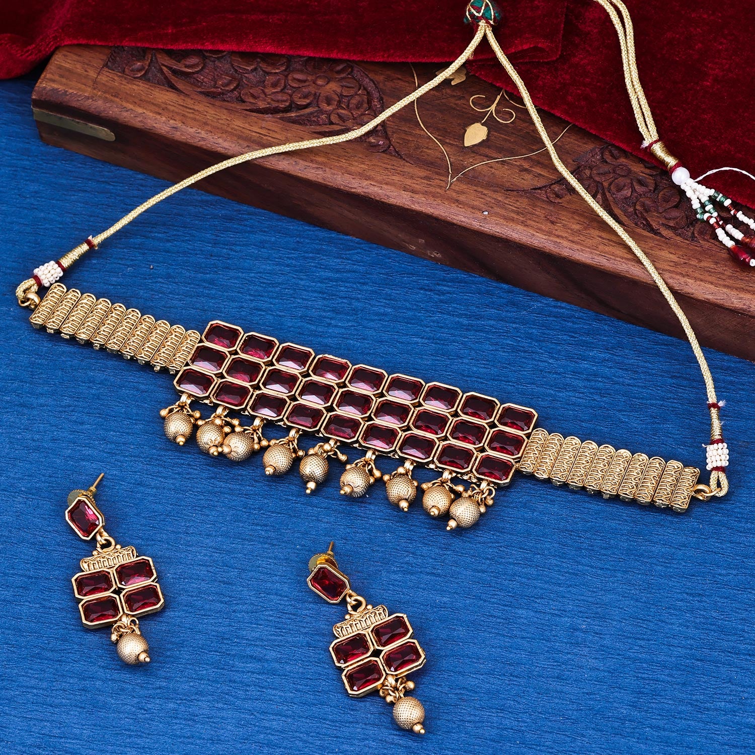 Sukkhi Absorbing Gold Plated Pearl Maroon Necklace Set for Women