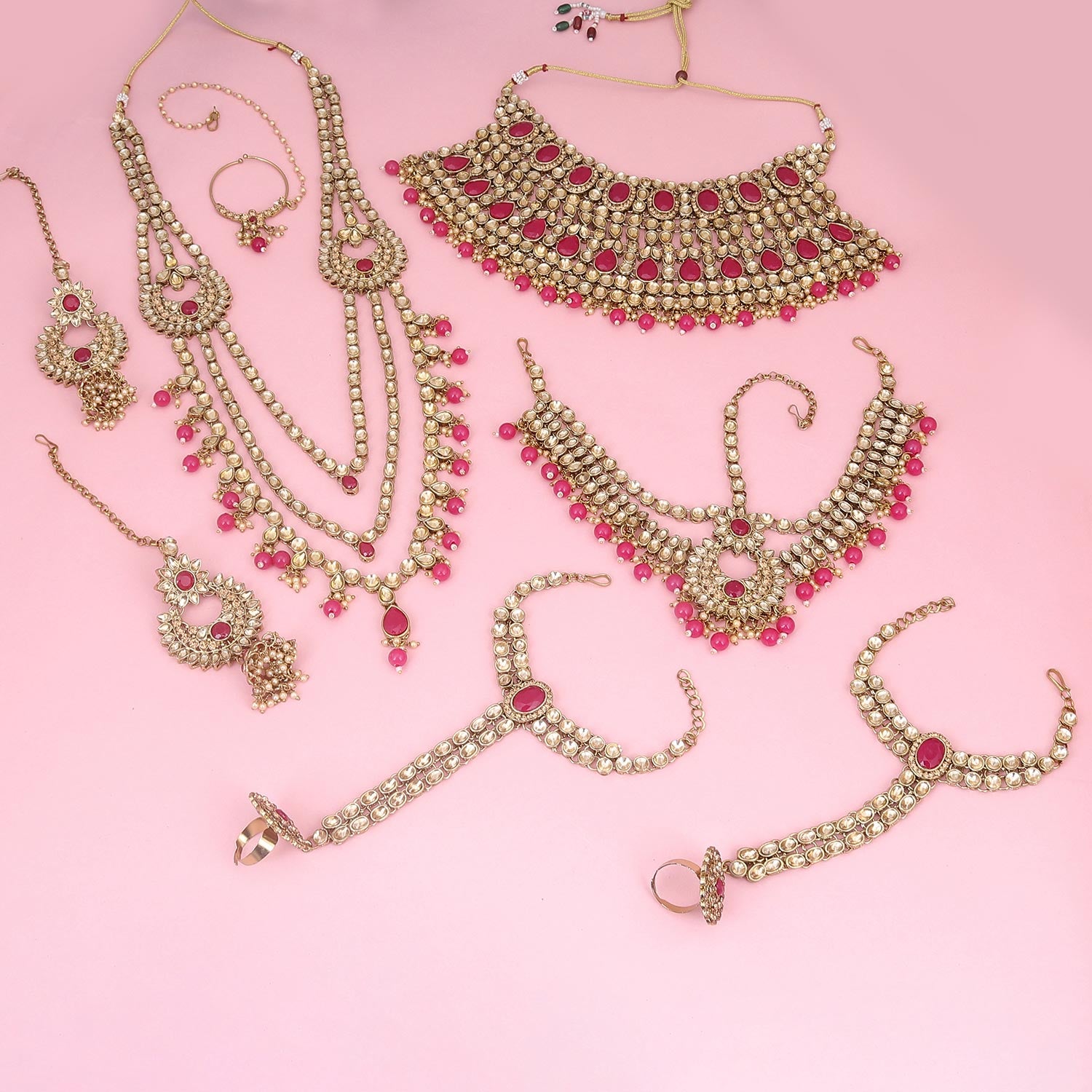Sukkhi arresting Pink Kundan & Pearl Gold Plated Long Dulhan Set for Women