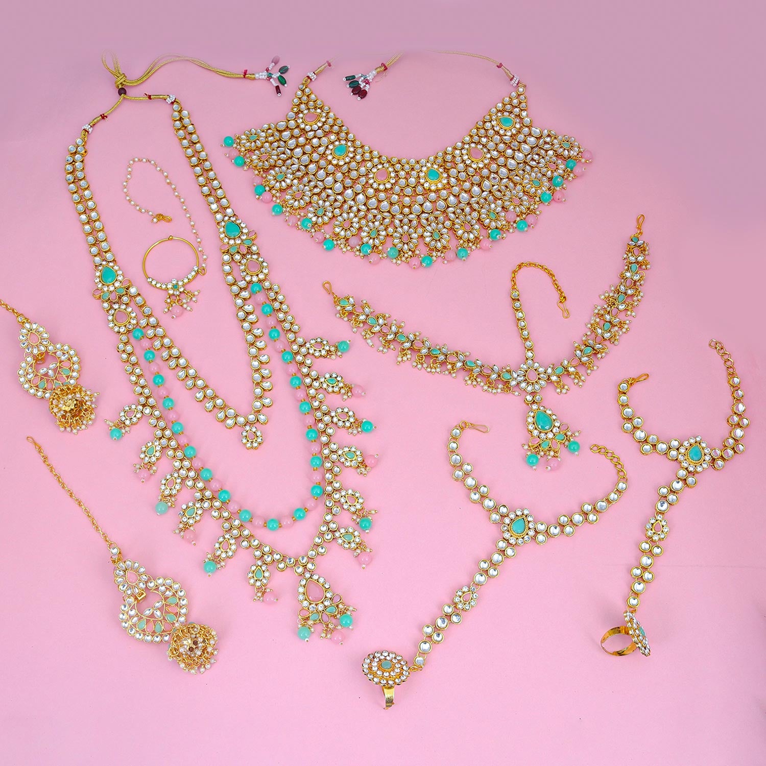 Sukkhi enthralling Pink & Green Kundan & Pearl Gold Plated Long Dulhan Set for Women