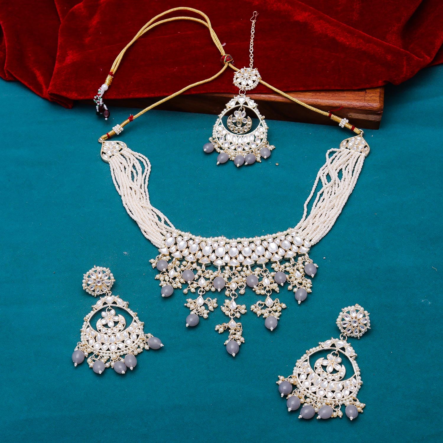 Sukkhi interesting Grey Kundan & Pearl Gold Plated Choker Necklace Set for Women