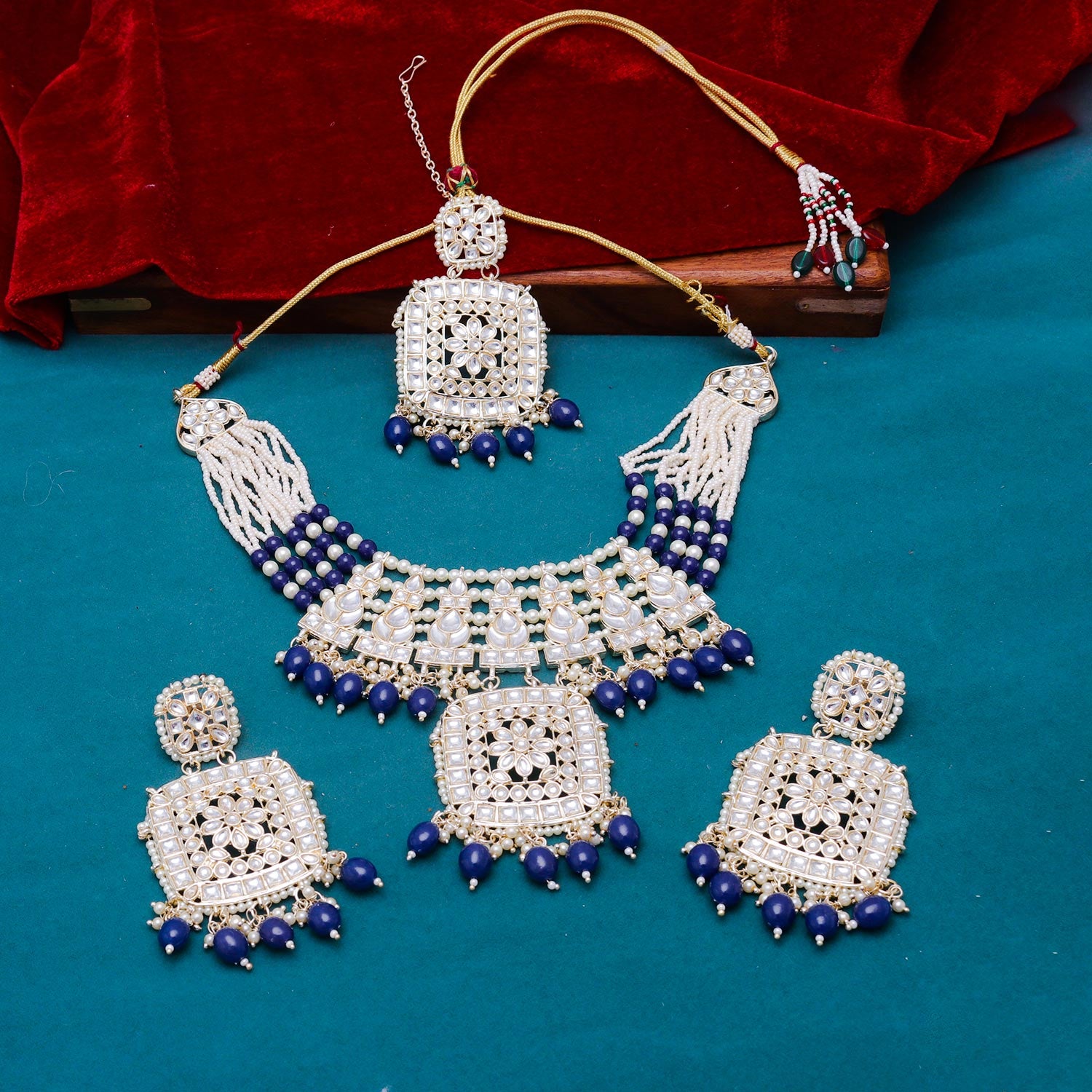 Sukkhi delightful Navy Blue Kundan & Pearl Gold Plated Choker Necklace Set for Women