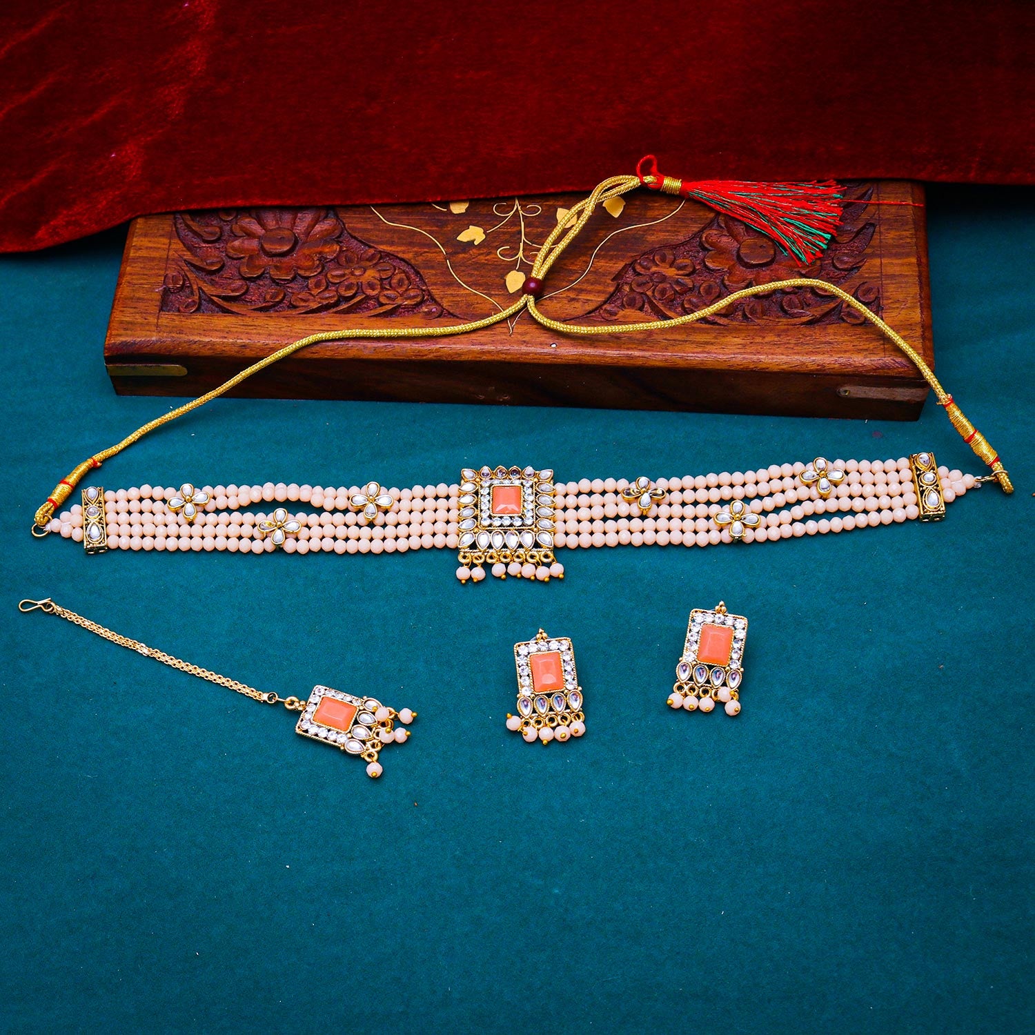 Sukkhi inviting Peach Kundan & Pearl Gold Plated Choker Necklace Set for Women